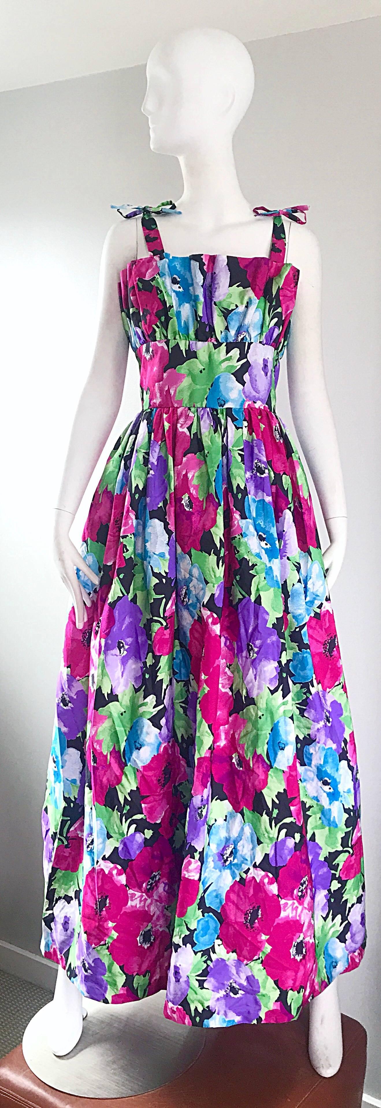 Gorgeous vintage late 80s VICTOR COSTA taffeta flower gown / maxi dress! Features a tropical flower print in vibrant colors of pink, fuchsia, blue, green and black. Avant Garde accordion detail at the bodice. Detachable ribbon ties at each shoulder