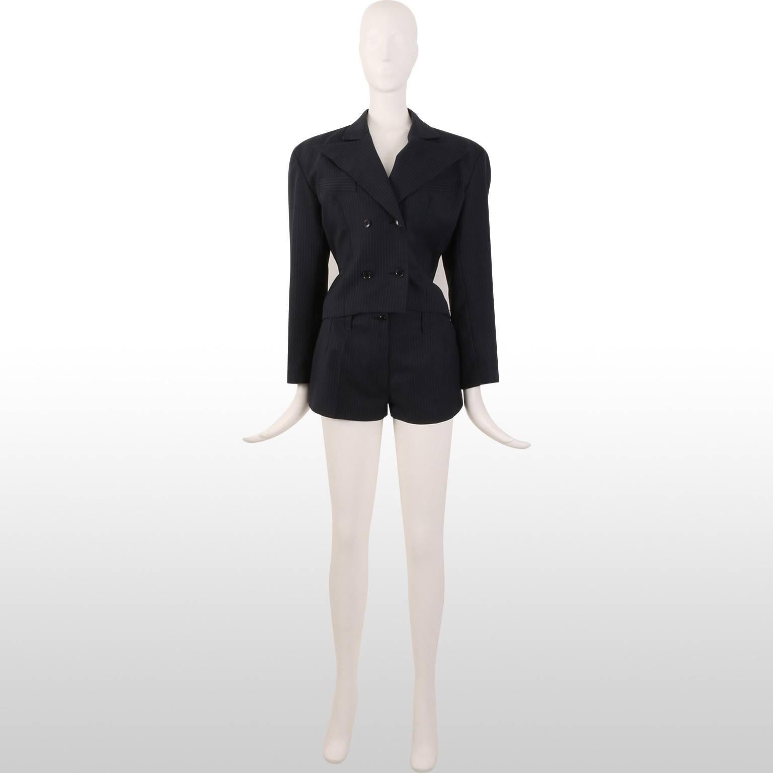 This 80s three piece - jacket, mini shorts and skirt suit by John Richmond was part of the era in which the designer dressed celebrities such as Madonna, Mick Jagger and even Alice Cooper. During this time John Richmond was known for feeding the