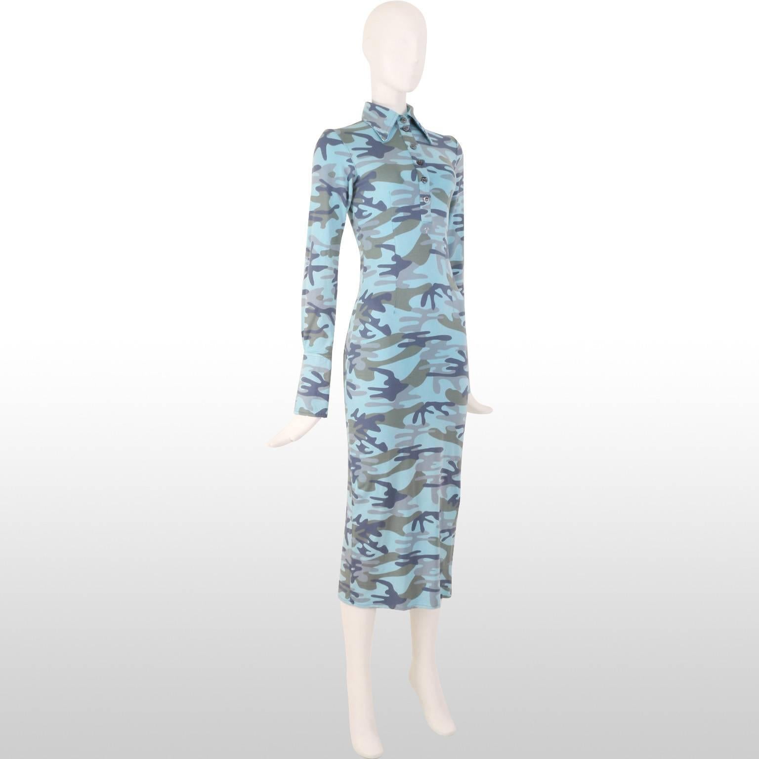Funky blue camouflage shirt dress by Voyage featuring a bold pointed collar with a beaded edge, buttons that partially run down the front of the garment and a diamante 'v' under the bust. The stretchy fabric makes this a comfortable piece to wear,