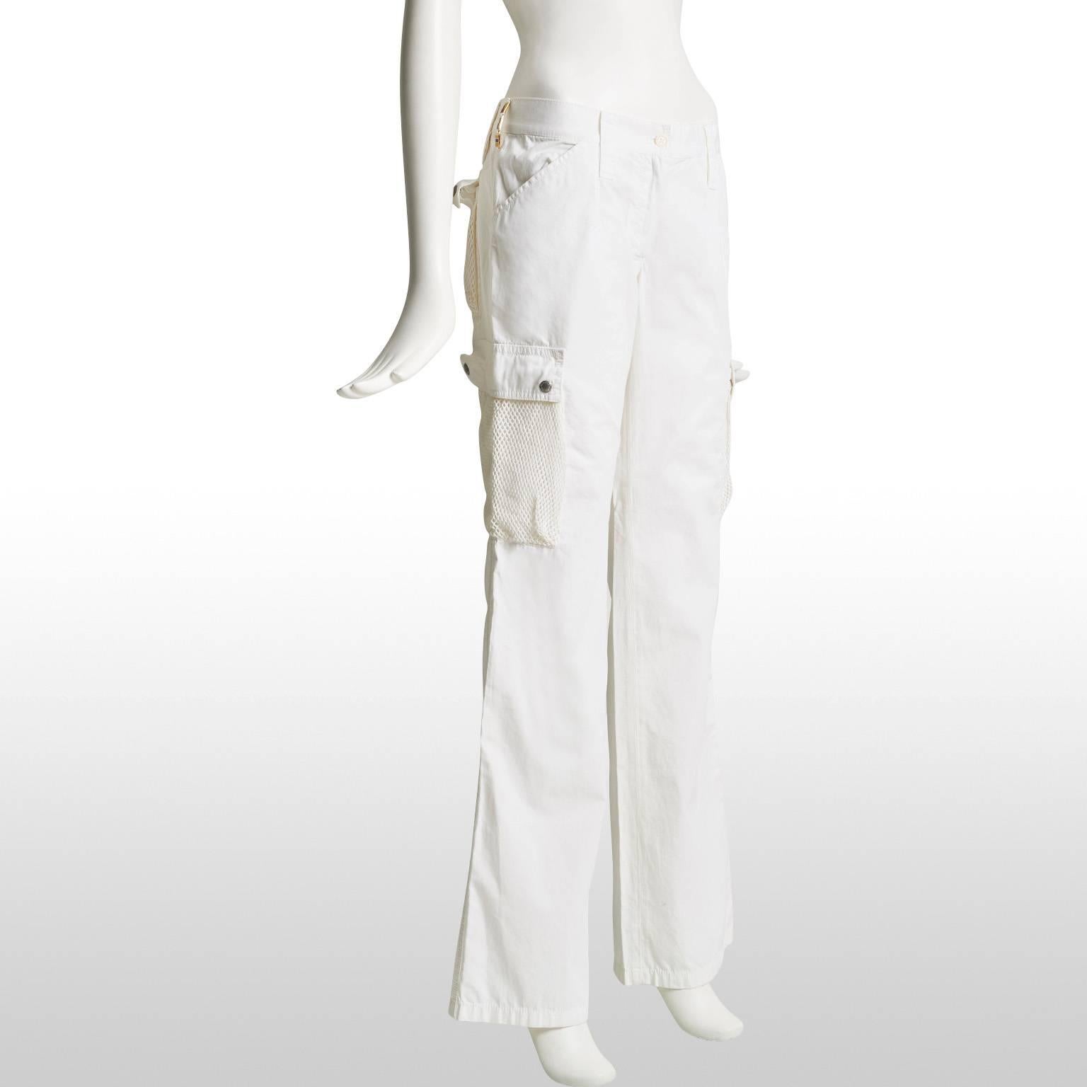 Funky Dolce and Gabbana egg white, straight leg cargo style trousers with mesh flap pockets at the side of the leg and at the back. The trousers sit comfortably on the hips and can also be worn with a belt, two of the belt loops features a gold