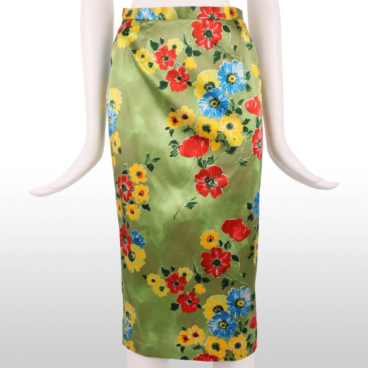 This bright and beautiful pencil skirt from Dolce and Gabbana is a great way to inject some colour into your summer wardrobe. The fun and bright floral print in tones of cornflower blue, strawberry red and sunshine yellow compliments the simplistic