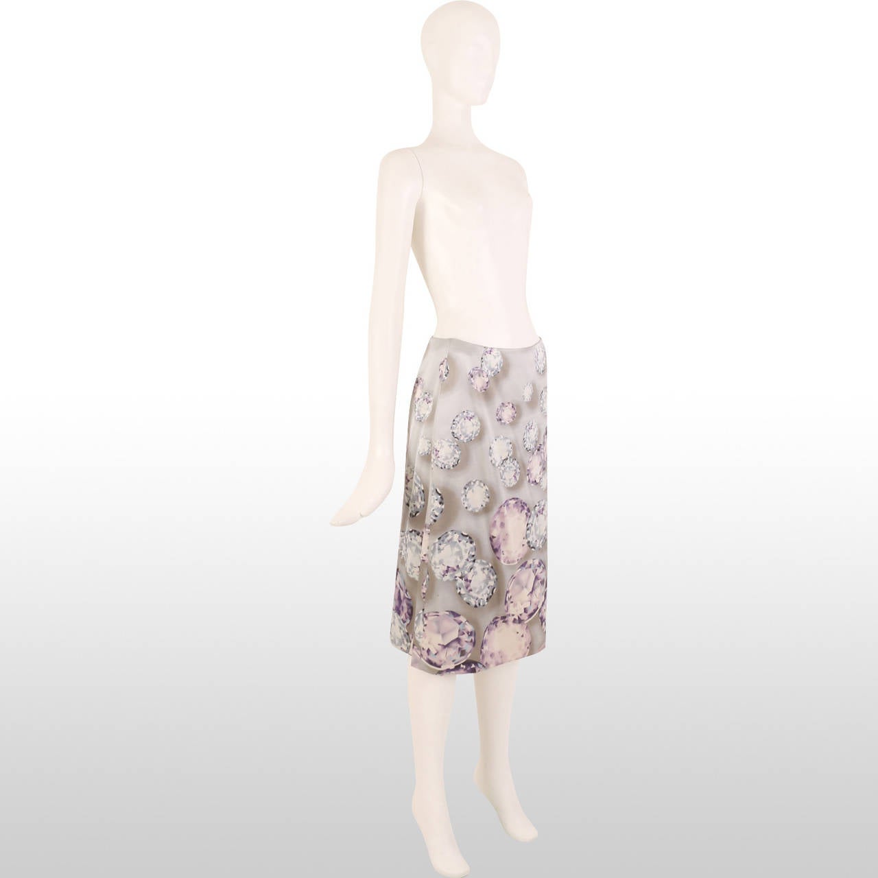 This beautiful Versace skirt has a gorgeous blush pink and blue gem print that makes it both elegant and delicate. Can be worn during the day time with a light grey knitted jumper but also works beautifully styled up for a cocktail party. Remains in