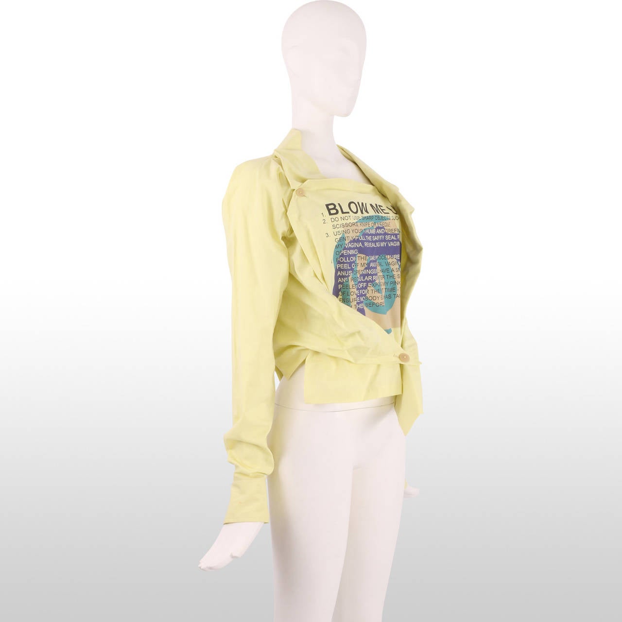 Here is a touch of boldness with this Vivienne Westwood printed blouse from the 2005 autumn winter collection. The light lemon yellow cotton contrasts quite strongly with the centered 