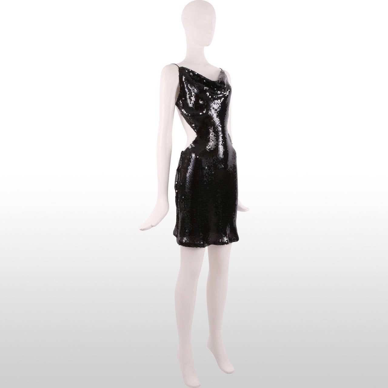 This is a very sexy and skin revealing sequin dress by the designer Maria Grachvogel, who is one of Victoria Beckham's favourite designers. Remains in excellent condition.