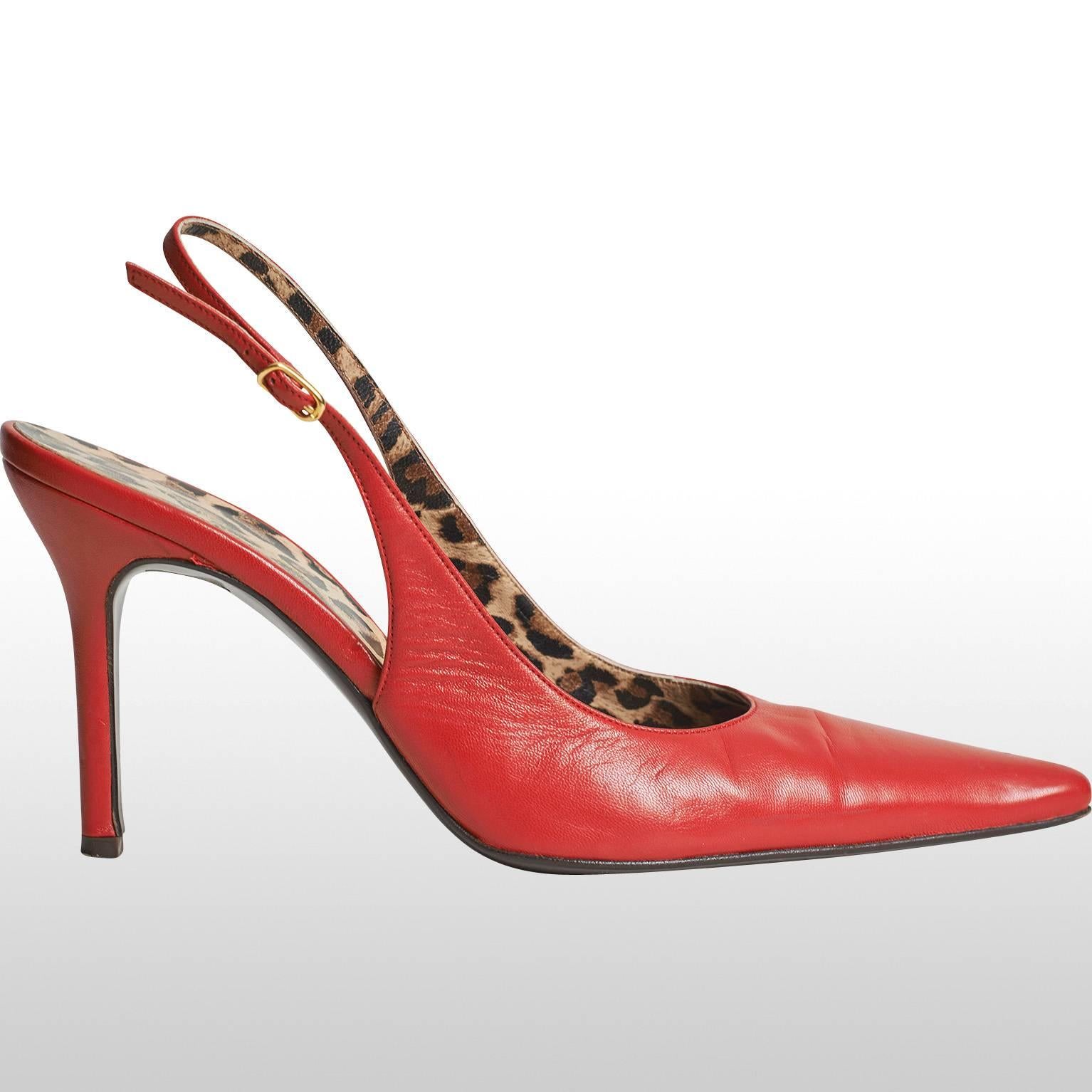 These gorgeous D&G red high heel sandals have a 4 inch heel. The insole of the sandal has a leopard print and the outer red part is made out of leather. The front of the shoe is pointy where as the heel is exposed and only secured by a small strap