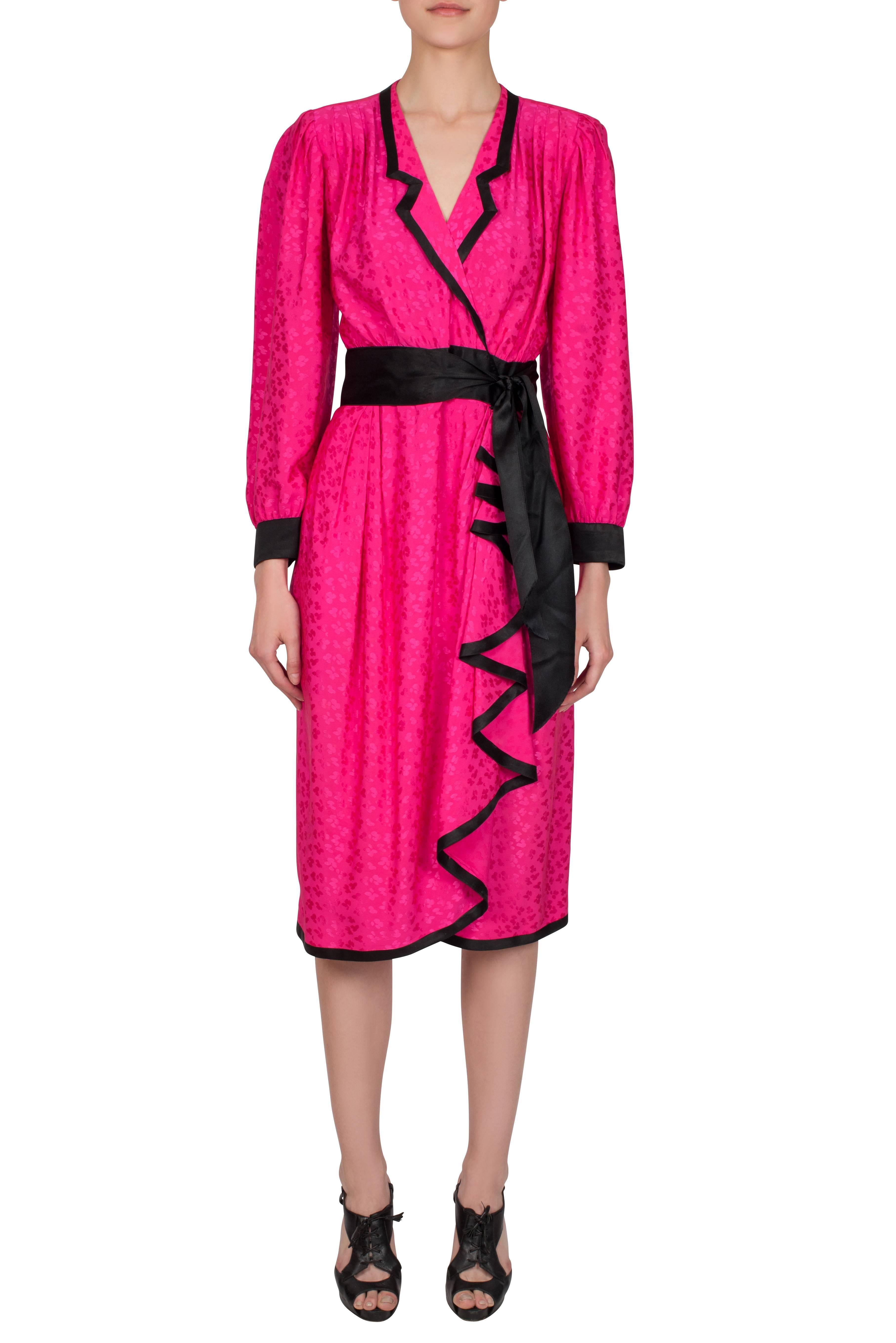 A striking 1980s hot pink silk Emanuel Ungaro Couture midi-length wrap dress with a delicate jacquard floral pattern. This soft, lightweight dress wraps and fastens at the waist using a combination of hook-and-eye and press stud fastenings. These