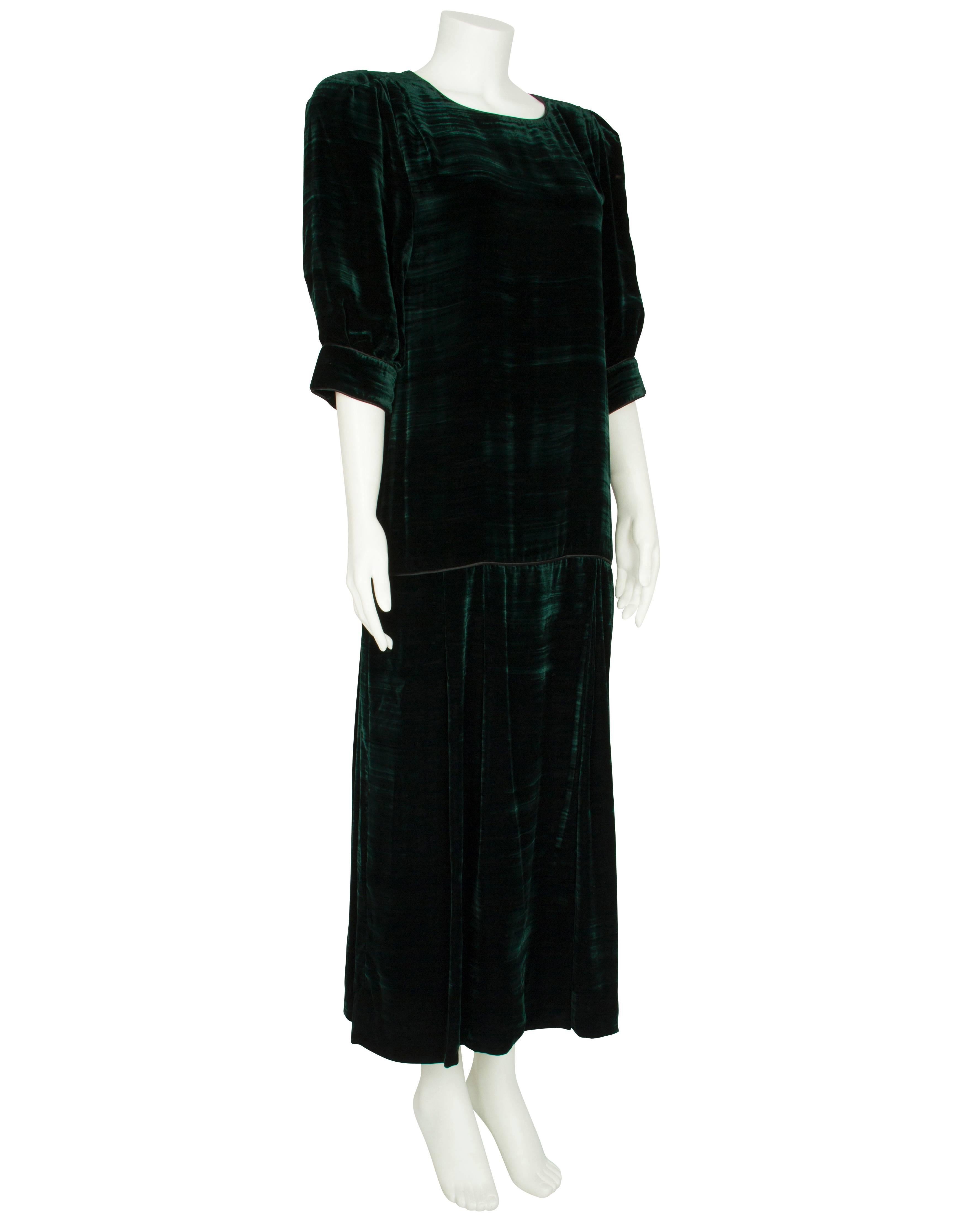 A luxurious 1980s Anouska Hempel deep forest green crushed velvet maxi dress with puffed sleeves and an elegant velvet sheen. The soft, heavy dress is cut in a straight shift shape with a dropped waist marked by black silk piping, before gently
