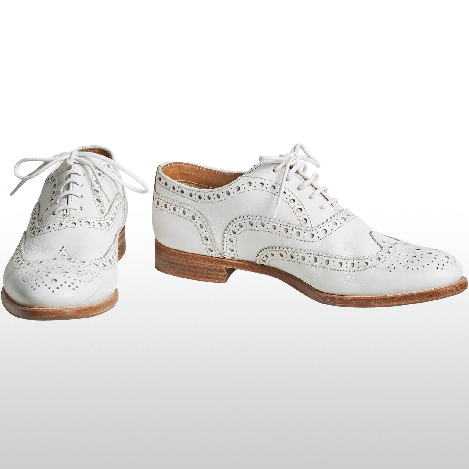These are white brogues shoes from the brand Church, which is a high quality footwear brand. Remain in excellent condition.