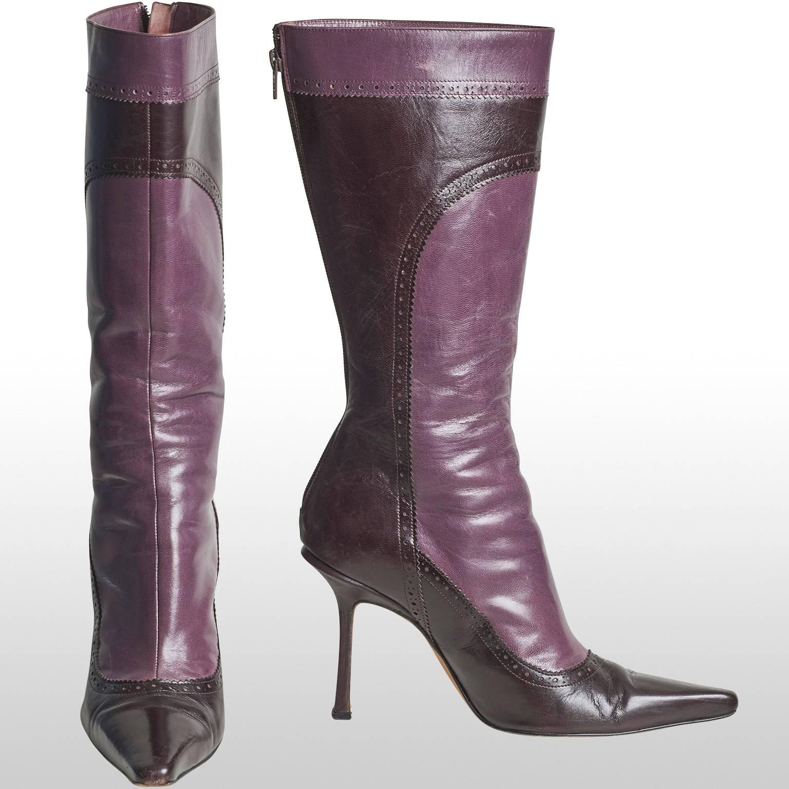 These are beautiful Jimmy Choo high heel boots. They are made out of two purple leather tones and have a leather stitch detail, which some might know as broguing. The total length of the boot is 16 inches which includes the hight of the heel which