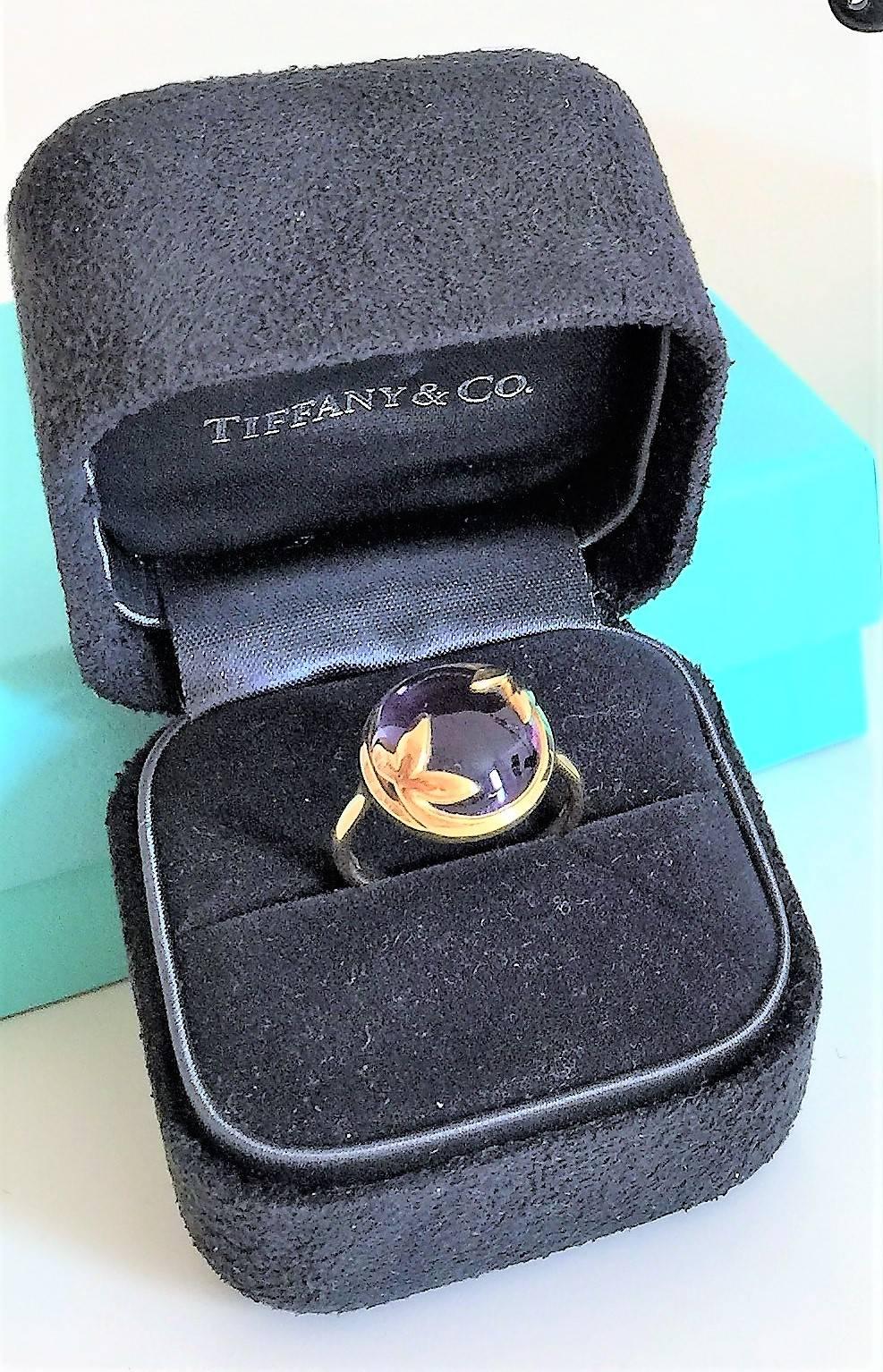 Designed by Paloma Picasso, this beautiful gold ring crafted by Tiffany has sculpted olive leaves in 18k gold as symbol of peace and abundance. Ring in 18k gold with an 6 Carats amethyst. Retail Price $1100
Dim.: 0.75