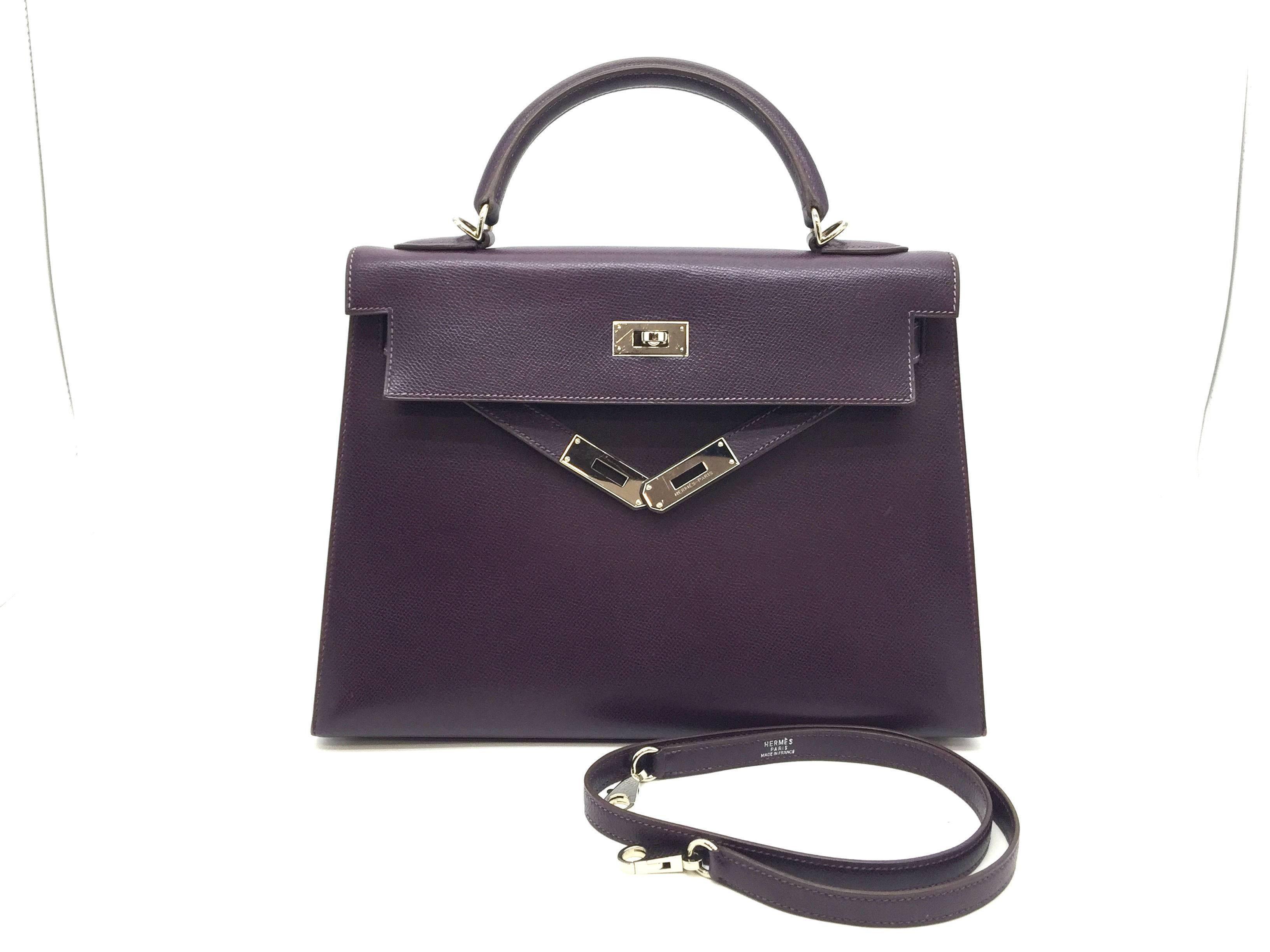 Color: Purple / Raisin (designer color)
Material: Courchevel Leather

Condition:
Rank A
Overall: Good, minor defects
Surface:Minor Scratches
Corners:Minor Scratches
Edges:Minor Scratches
Handles/Straps:Minor Scratches
Hardware:Minor