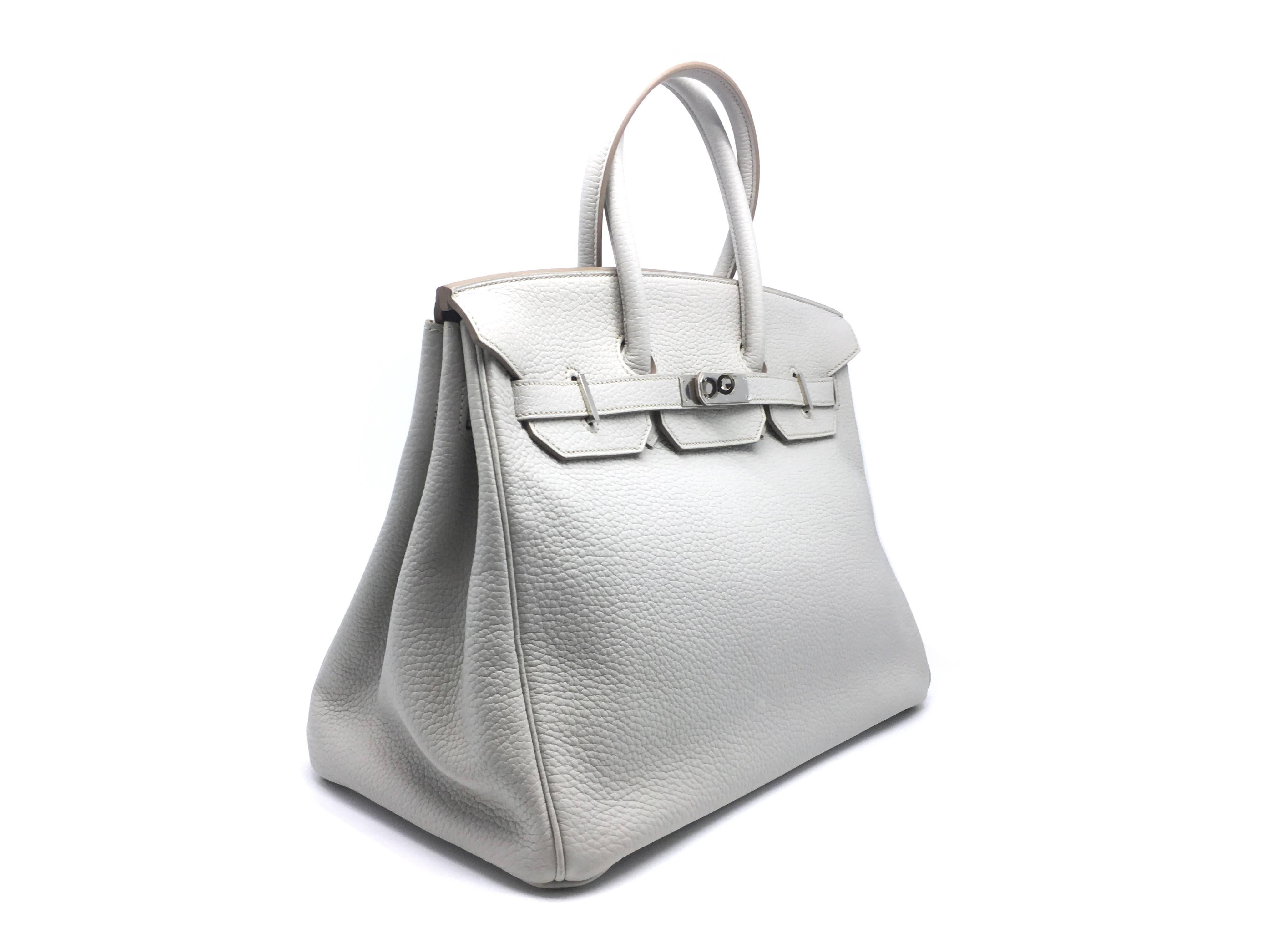 Color: Pearl Grey / Gris Perle (designer color)
Material: Togo leather

Condition:
Rank N
Overall: Brand New Not Used
Surface: Good
Corners: Good
Edges: Good
Handles/Straps: Good
Hardware: Good

Dimensions:
W35 × H29 × D18.5 cm (W13.75" x