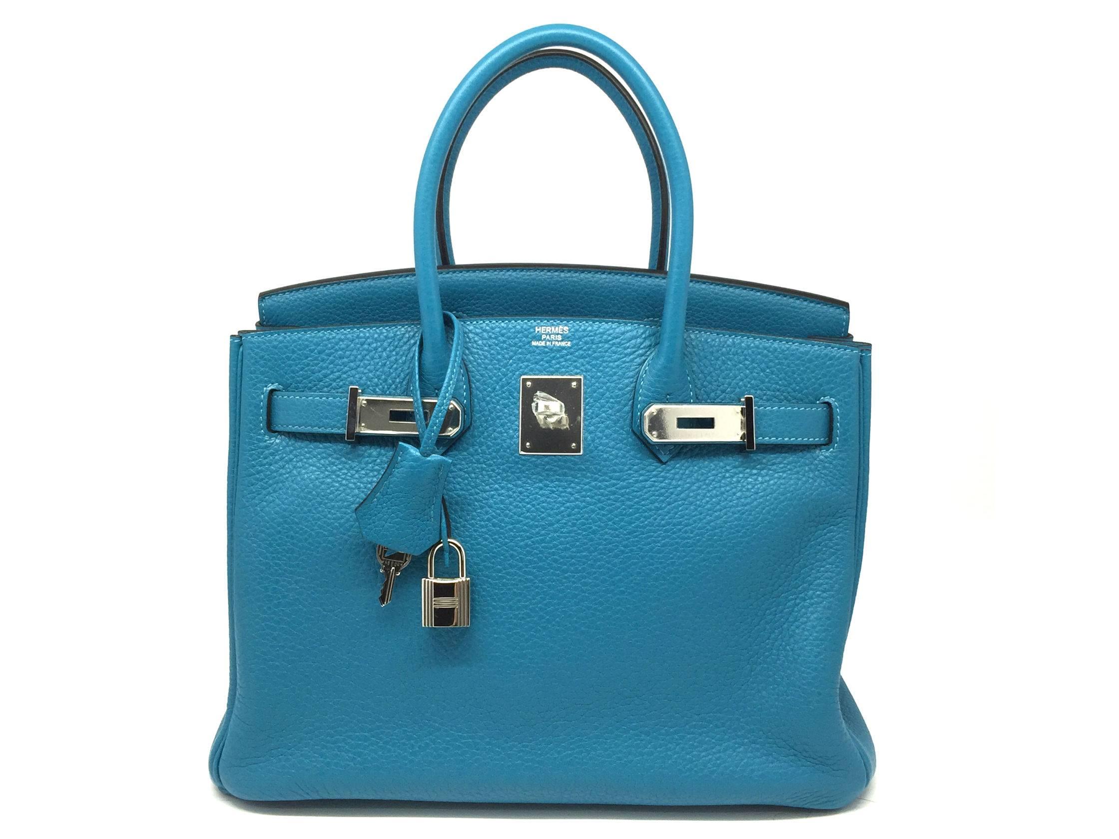 Color: Turquoise Blue
Material: Clemence Leather

Condition:
Rank N
Overall: Brand New Not Used
Surface: Good
Corners: Good
Edges: Good
Handles/Straps: Good
Hardware: Good


Dimension:
W30 x H22 x D16 cm

Stamp: R in square (2014)
come with lock and