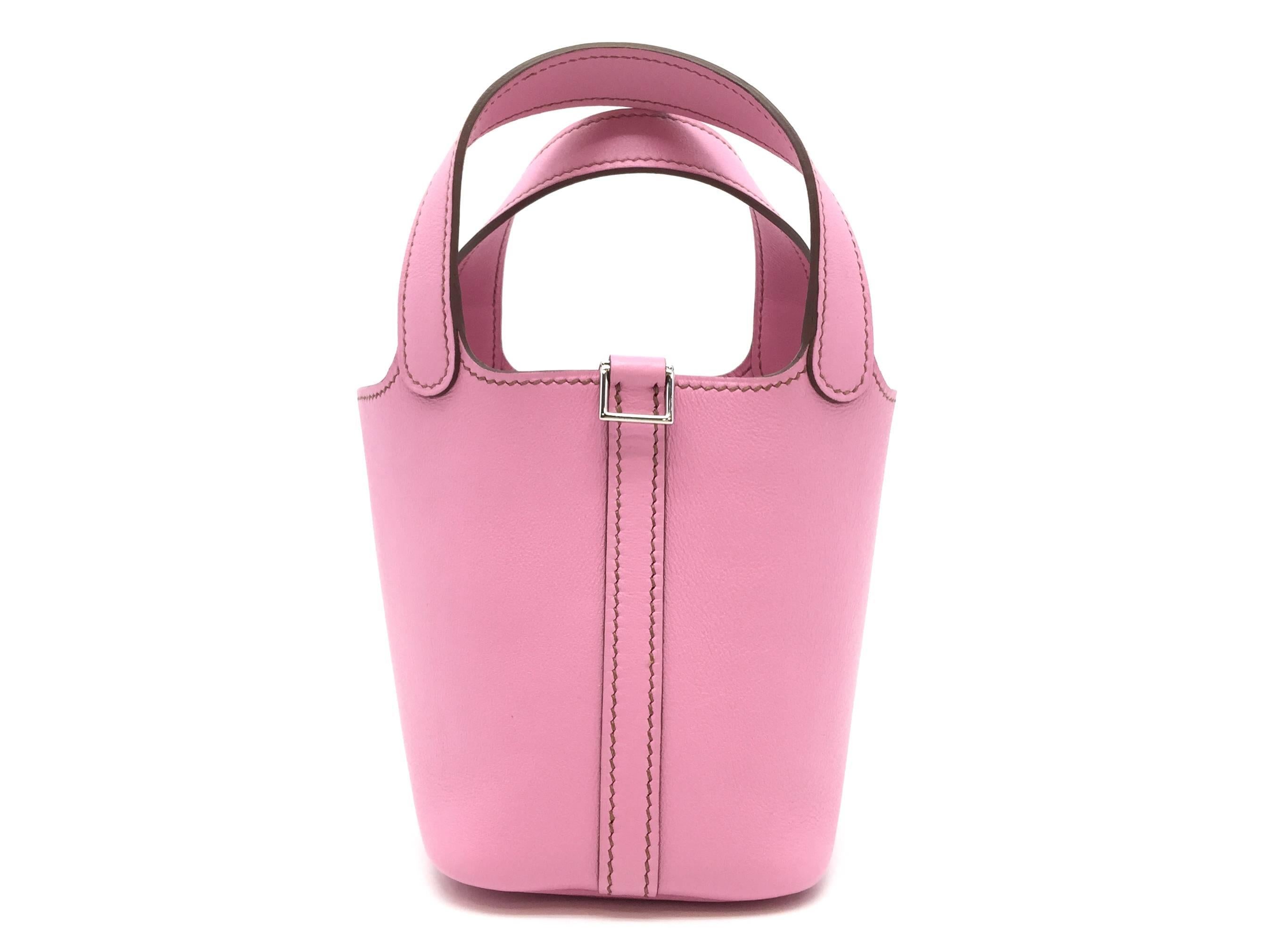 Color: Bubblegum Pink 
Material: Swift Leather 

Condition:
Rank A
Overall: Good, few minor defects
Surface: Good
Corners: Good
Edges: Good
Handles/Straps: Good
Hardware: Minor Scratches

Dimension:
W9 × H12.5 × D12.5cm（W3.5" × H4.9" ×
