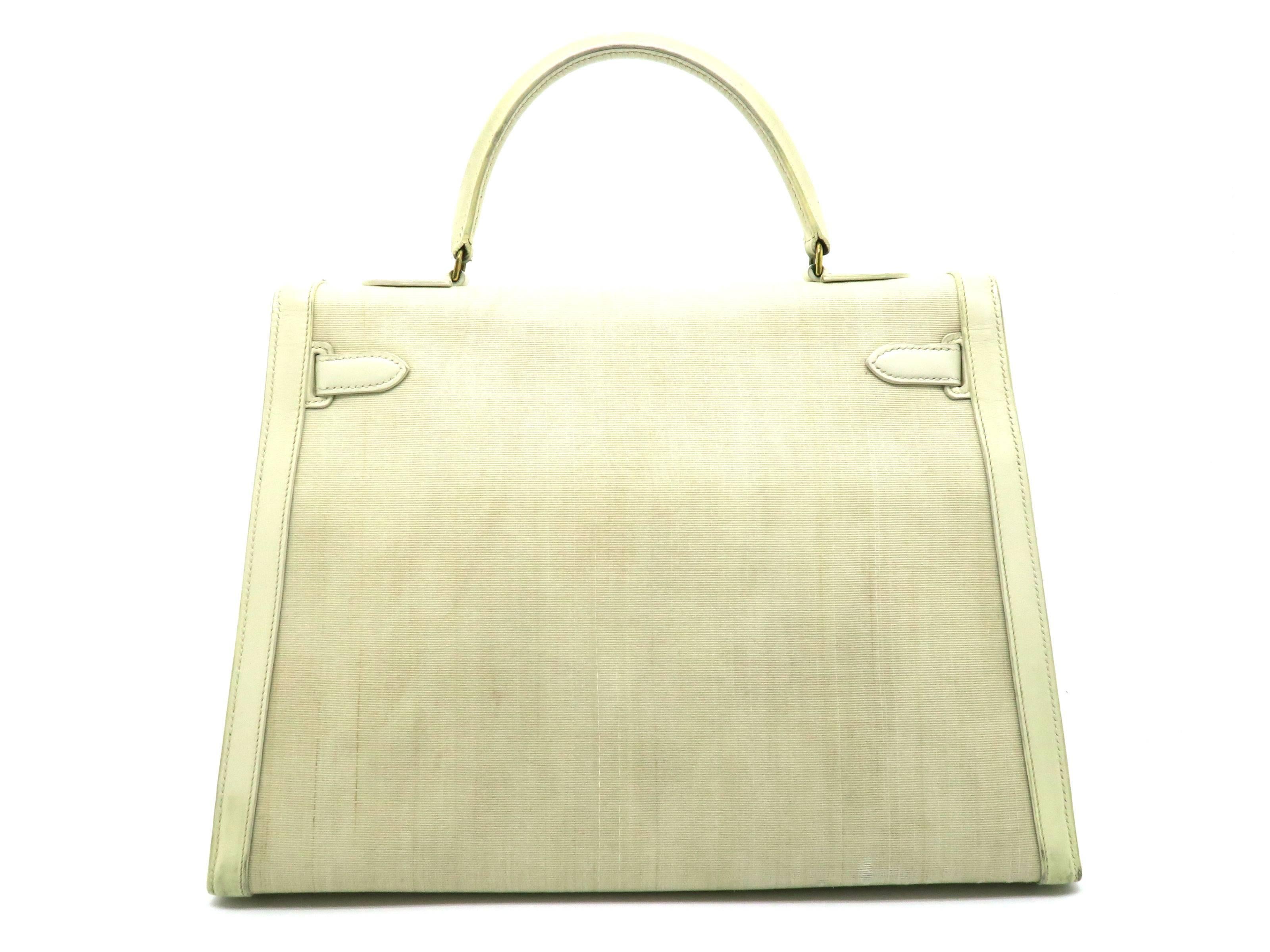 Hermes Kelly 35 Jaune Poussin Beige Box Calf Leather and Canvas Top Handle Bag In Fair Condition For Sale In Kowloon, HK