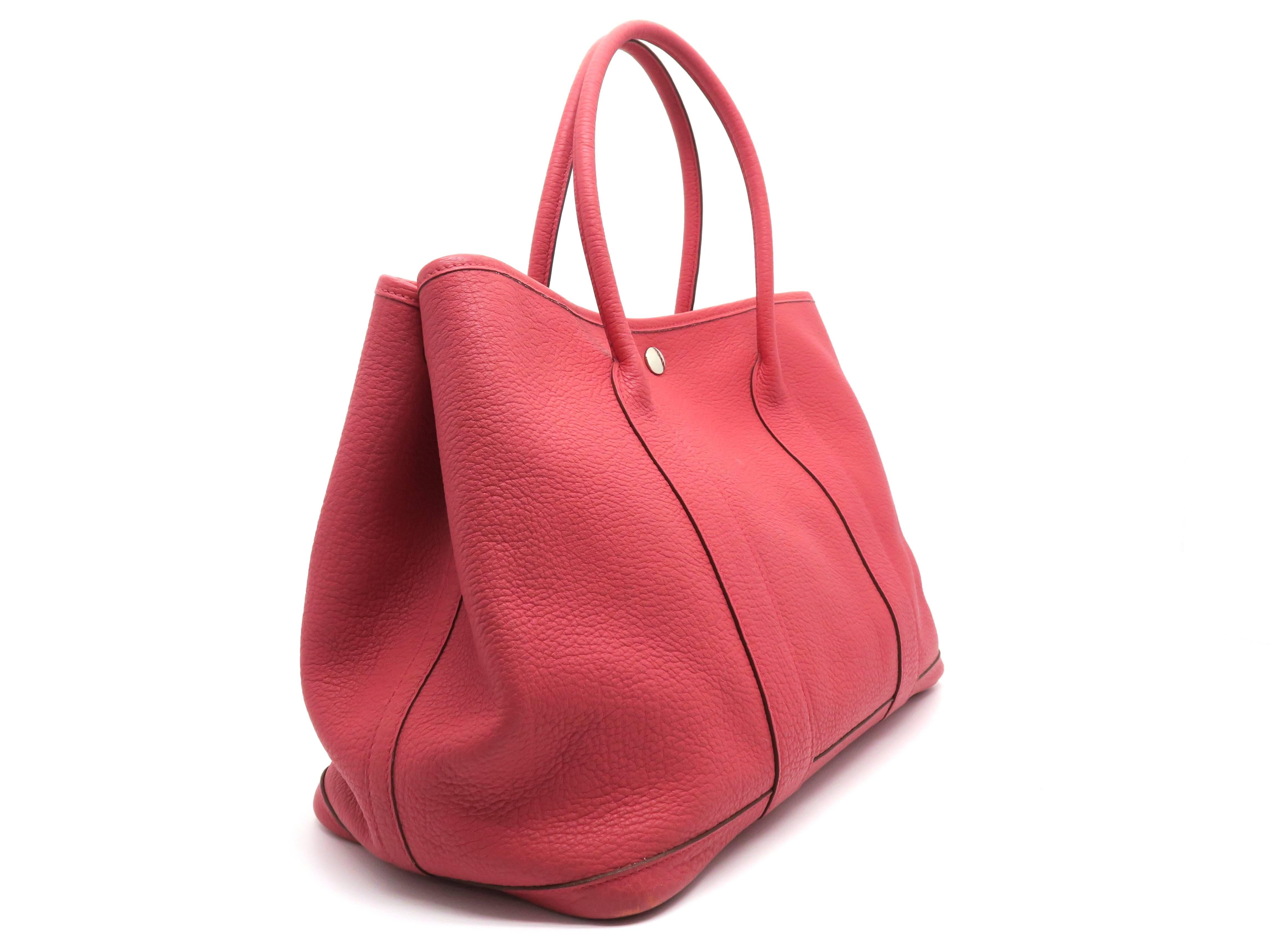 Color: Red / Rouge Duchesse (designer color) 

Material: Negonda Leather

Condition: Rank A 
Overall: Good, few minor defects
Surface: Good
Corners: Minor Scratches & Stains
Edges: Good
Handles/Straps: Good
Hardware: Minor Scratches
Inside:
