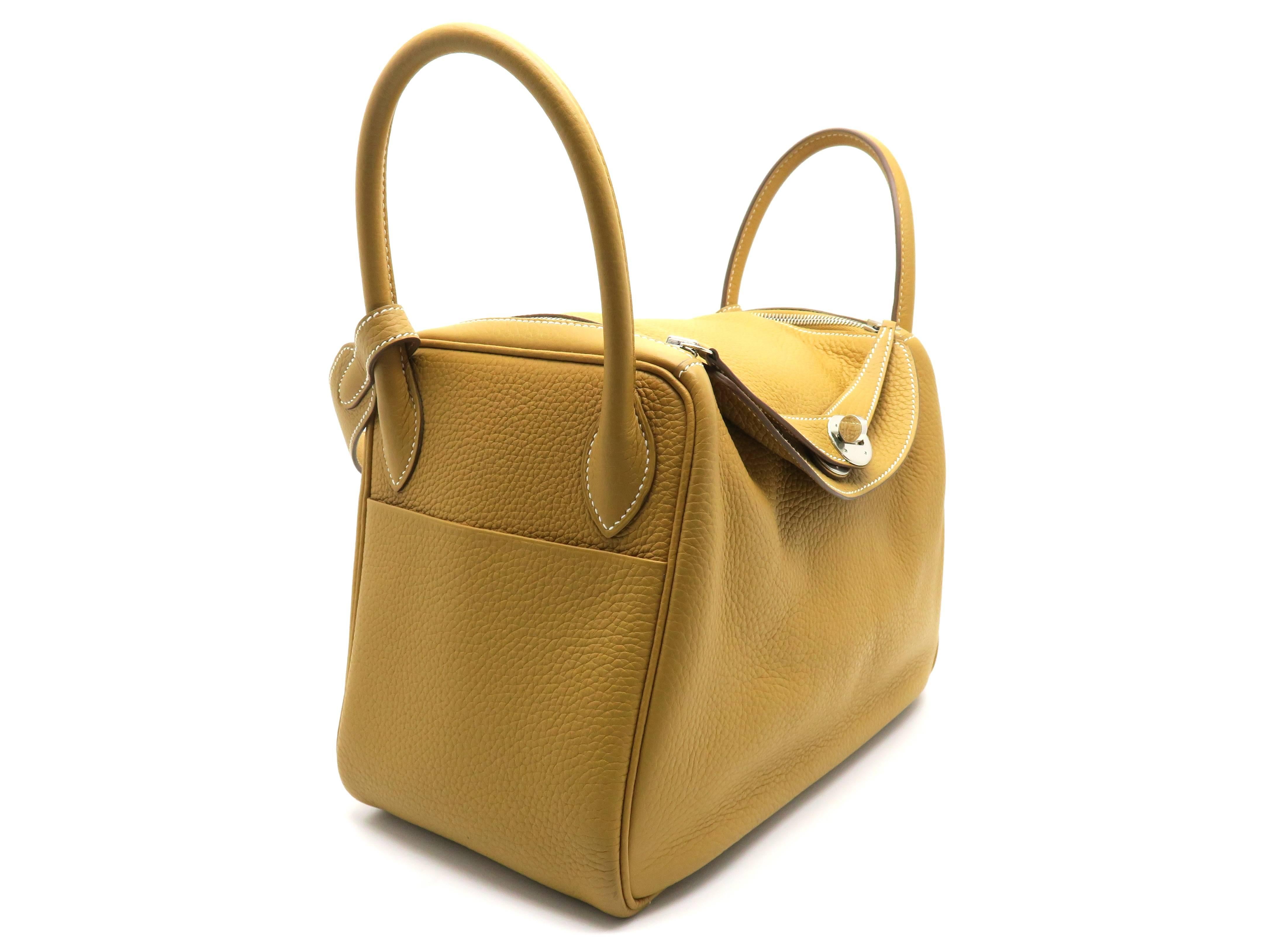 Color: Yellow / Natural Sable (designer color) 

Material: Clemence Leather

Condition: Rank A 
Overall: Good, few minor defects
Surface: Minor Stains
Corners: Minor Stains
Edges: Good
Handles/Straps: Good
Hardware: Good

Dimension: W30 × H19 ×