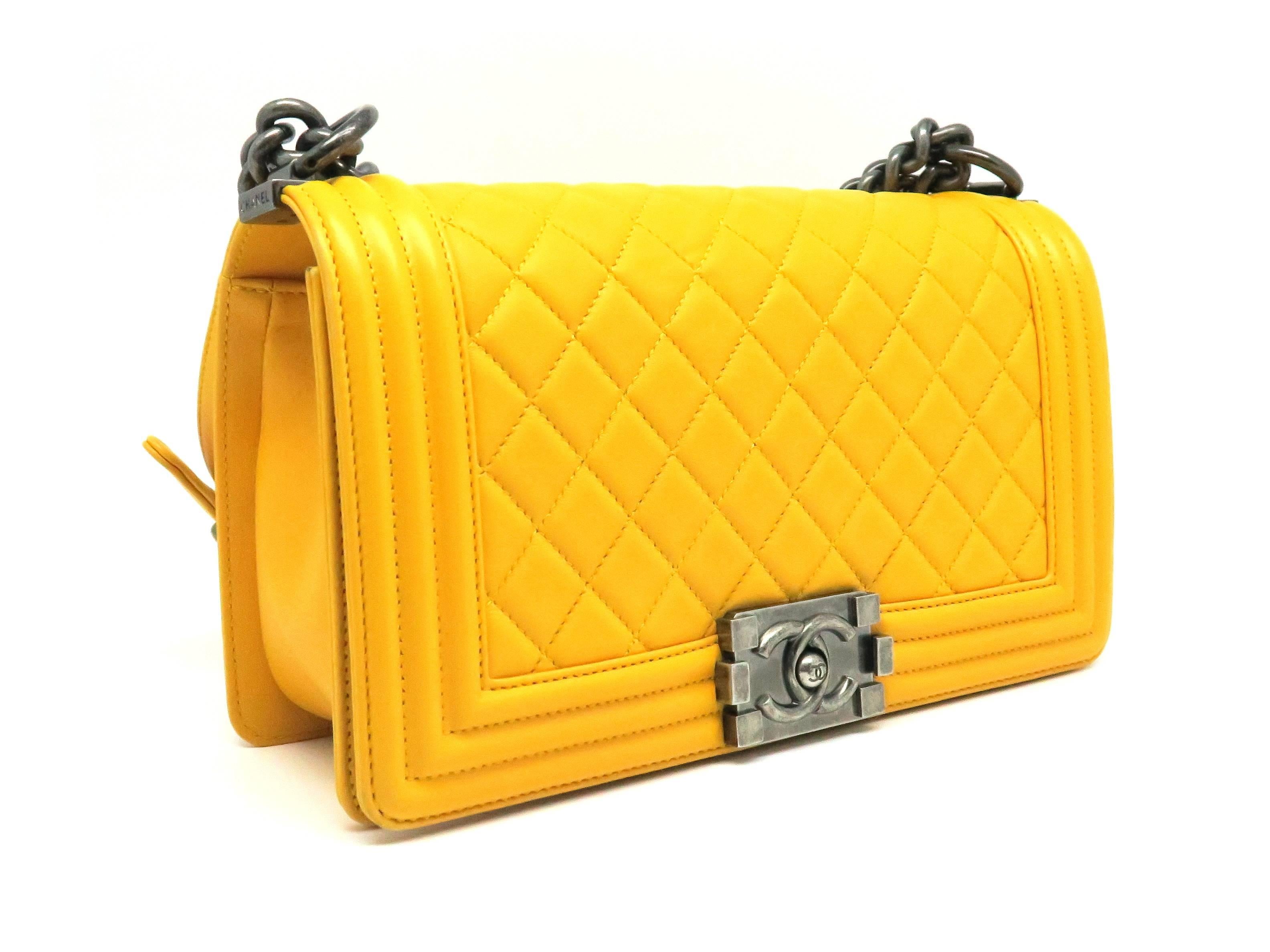 Color: Yellow 

Material: Quilted Calfskin Leather

Condition: Rank A 
Overall: Good, few minor defects
Surface: Minor Scratches & Stains
Corners: Minor Scratches & Stains
Edges: Minor Scratches
Handles/Straps: Good
Hardware: