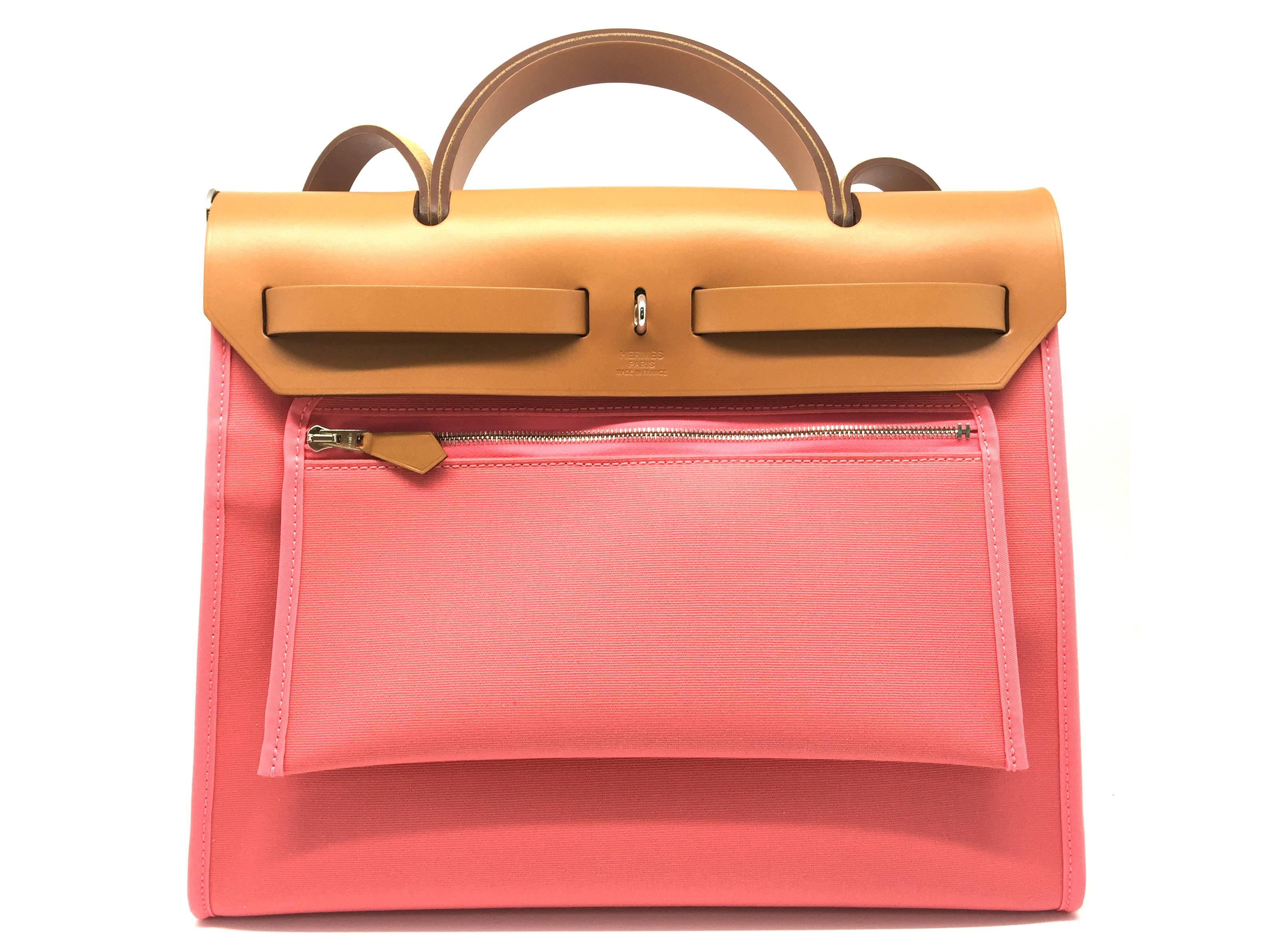 Color: Pink / Rose Azalee (designer color) 

Material: Canvas 

Condition: Rank N 
Overall: Brand new
Surface: Good
Corners: Good
Edges: Good
Handles/Straps: Good
Hardware: Good

Dimension: W31 × H25 × D10cm（W12.2" × H9.8" ×