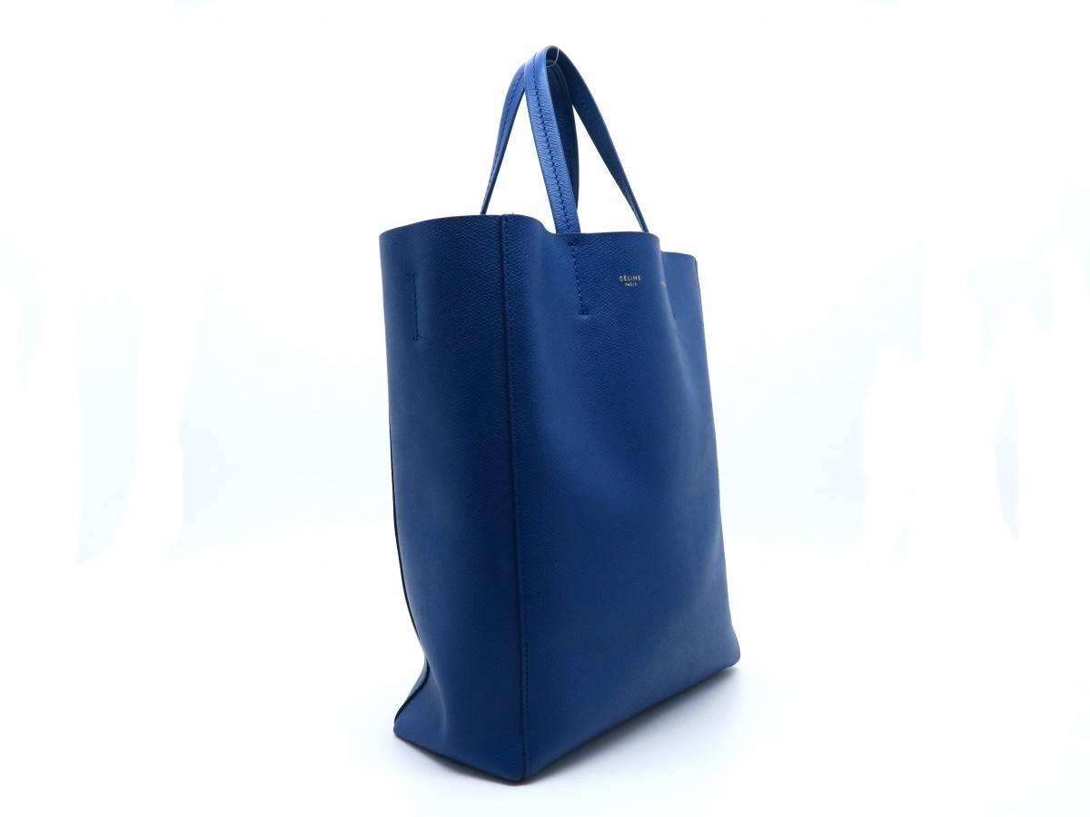Color: Blue 

Material: Calfskin Leather 

Condition: Rank A 
Overall: Good, few minor defects 
Surface: Minor Stains
Corners: Minor Scratches
Edges: Good
Handles/Straps: Good
Hardware: Good

Dimension: W23 × H28 × D10cm（W9.0" × H11.0" ×