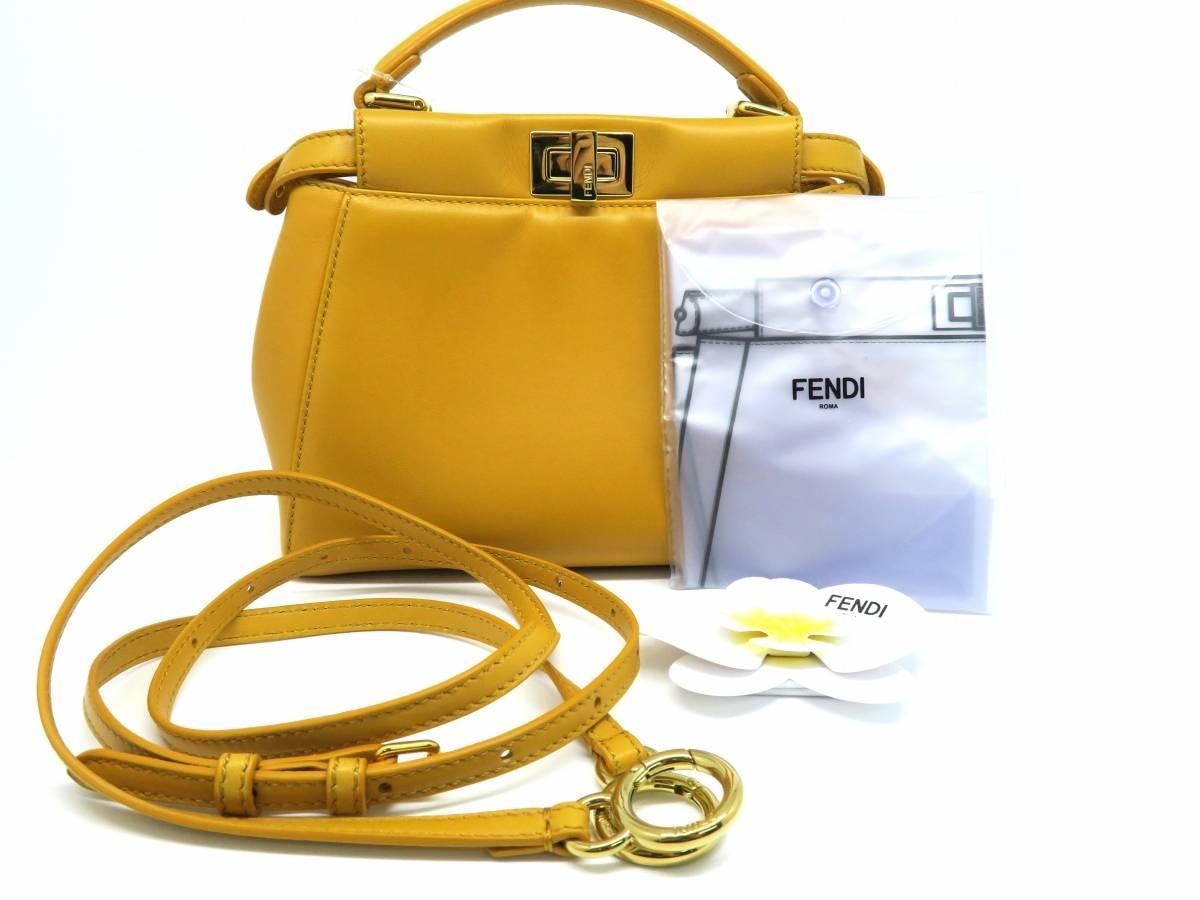 Color: Yellow 

Material: Lambskin Leather 

Condition: Rank B 
Overall: Fair. Few defects
Surface: Good
Corners: Minor Scratches
Edges: Good
Handles/Straps: Good
Hardware: Minor Scratches

Dimension: W23 × H18 × D11cm（W9.0" × H7.0" ×