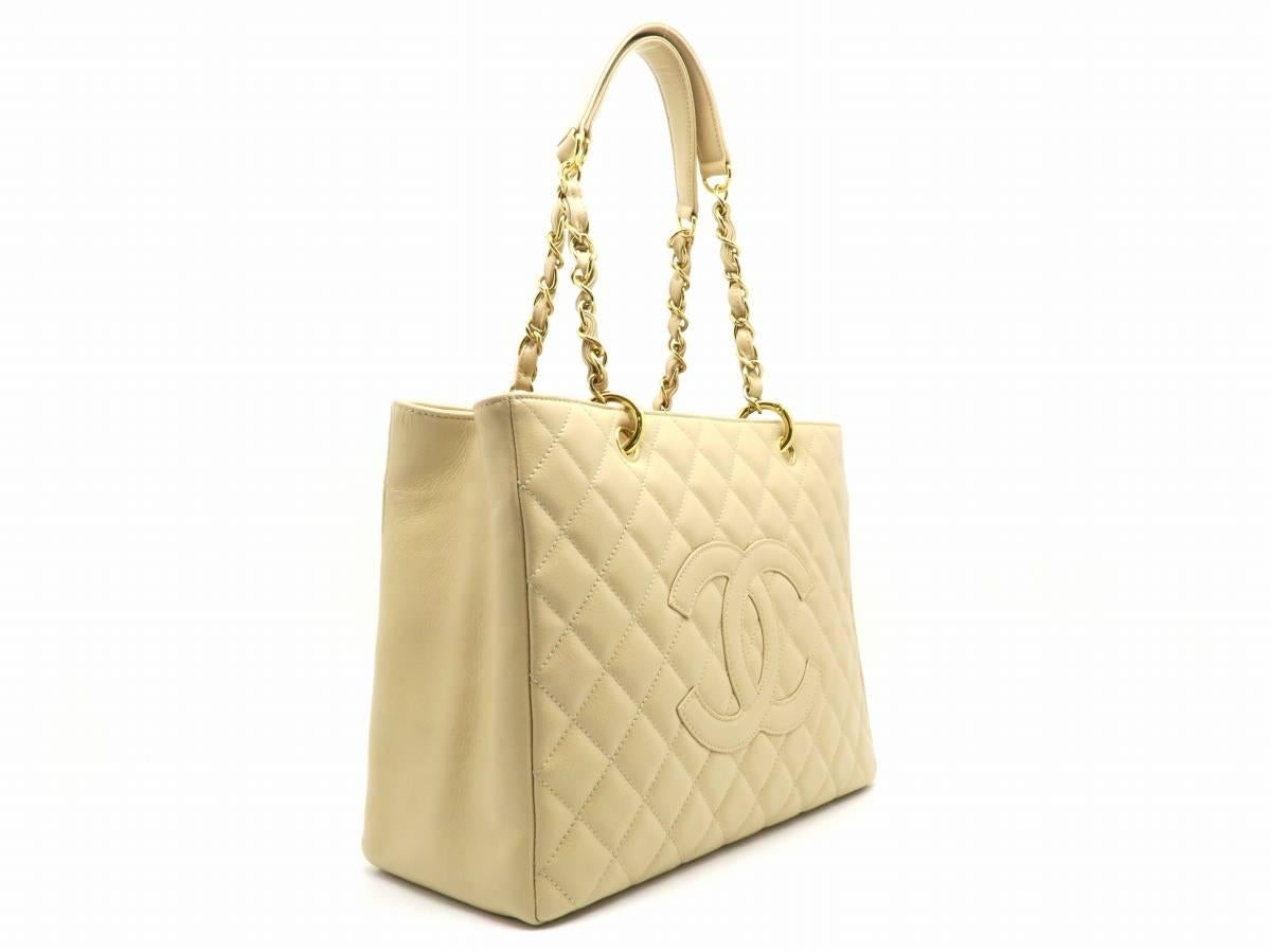Color: Beige 

Material: Quilted caviar leather

Condition: Rank A 
Overall: Good, few minor defects
Surface: Good
Corners: Good
Edges: Good
Handles/Straps: Good
Hardware: Minor Scratches

Dimension: W33.5 × H25 × D13cm
Shoulder strap:50cm

Serial