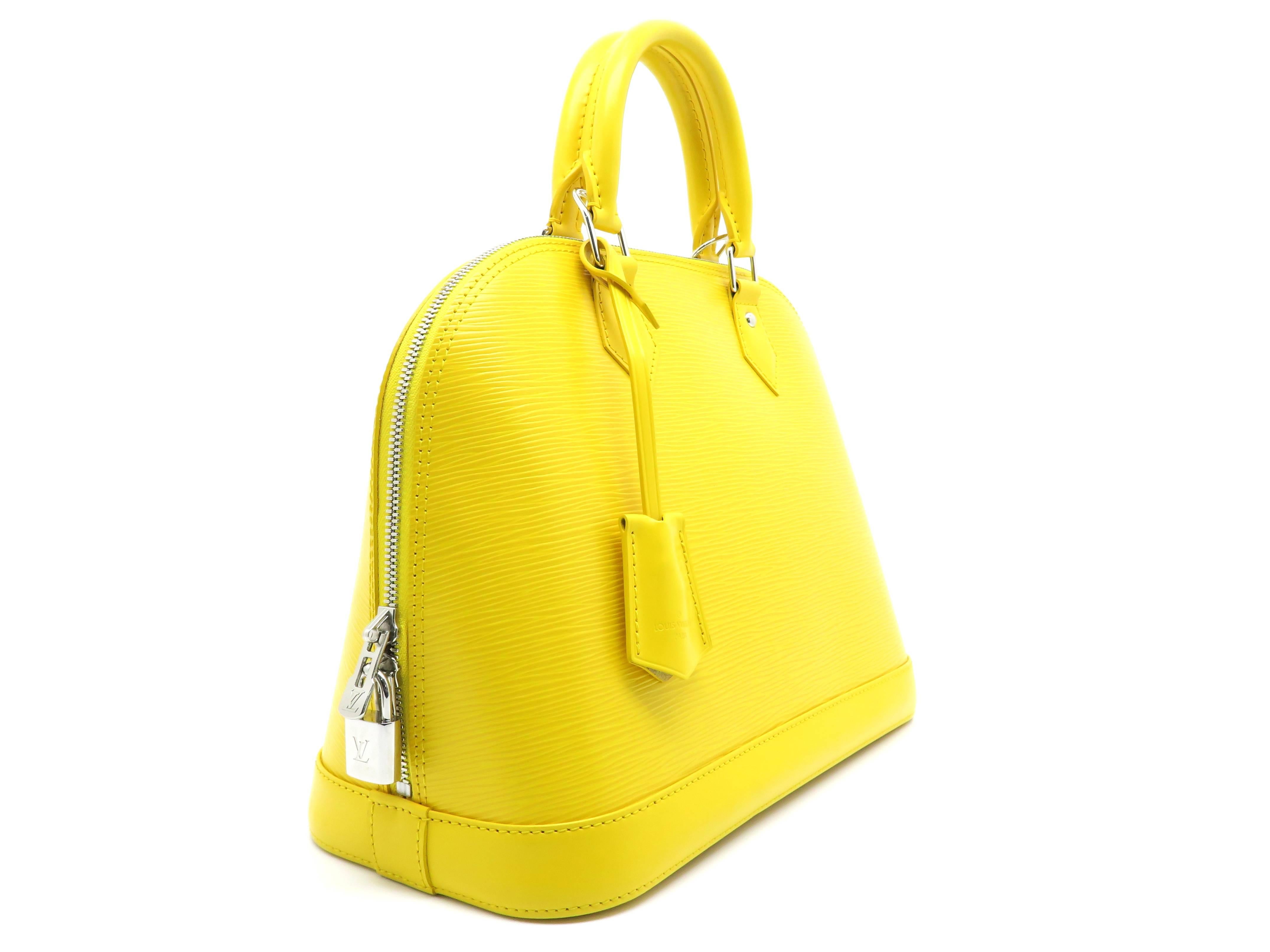 Color: Yellow
Material: Epi Leather

Condition: Rank S
Overall: Almost New
Surface: Good
Corners : Good
Edges: Good 
Handles/Straps: Good 
Hardware: Good
Bottom : Minor Stains

Dimension: W32 × H23 × D15.5cm（W12.5" × H9.0" ×