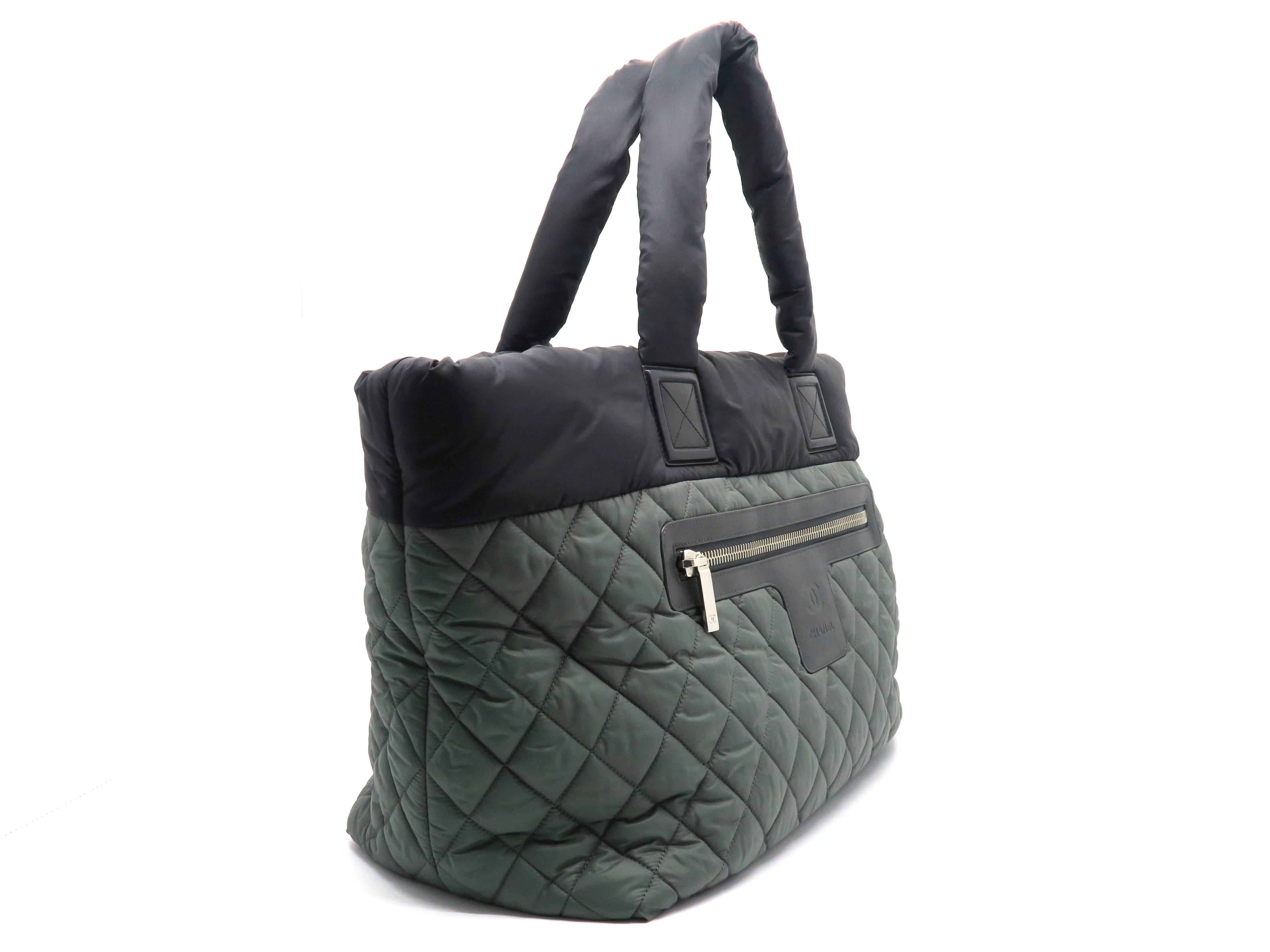 Color: Green/ Black
Material: Nylon

Condition: Rank A
Overall: Good, minor defects
Surface: Good
Corners : Good 
Edges: Good 
Handles/Straps: Minor Stains 
Hardware: Minor Scratches 

Dimension: W39 × H30 × D18cm（W15.3" × H11.8" ×