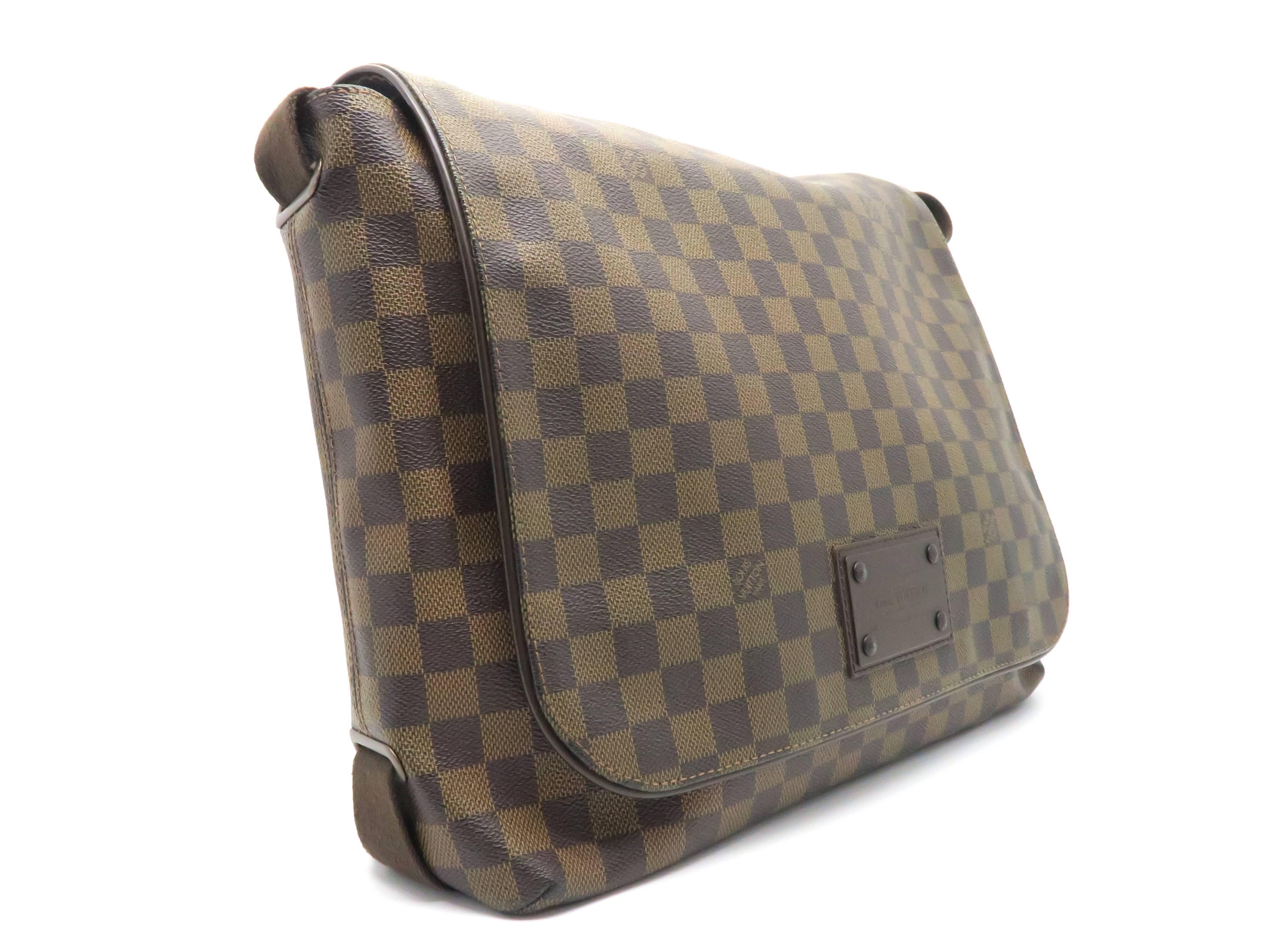 Color: Brown
Material: Damier Ebene Canvas

Condition: Rank A
Overall: Good, few minor defects
Surface: Good
Corners : Minor Stains 
Edges: Good 
Handles/Straps: Good
Hardware: Minor Scratches 
 

Dimension: W35 × H28 × D12cm（W13.7" ×