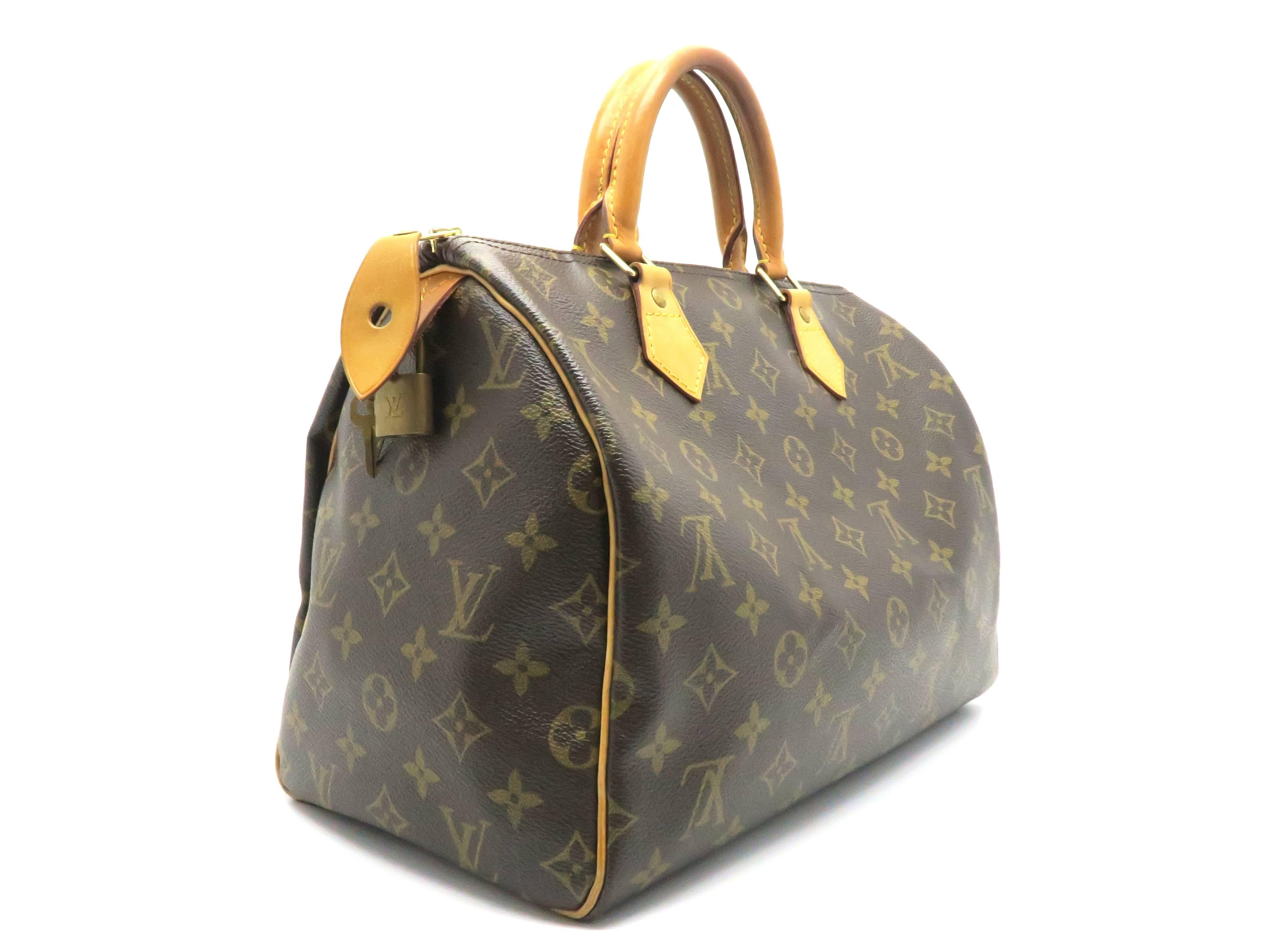 Color: Brown 

Material: Monogram Canvas

Condition: Rank A 
Overall: Good, few minor defects
Surface: Good
Corners: Good
Edges: Good
Handles/Straps: Minor Scratches and Stains
Hardware: Minor Stains

Dimension: W30 × H21 × D17cm（W11.8" ×