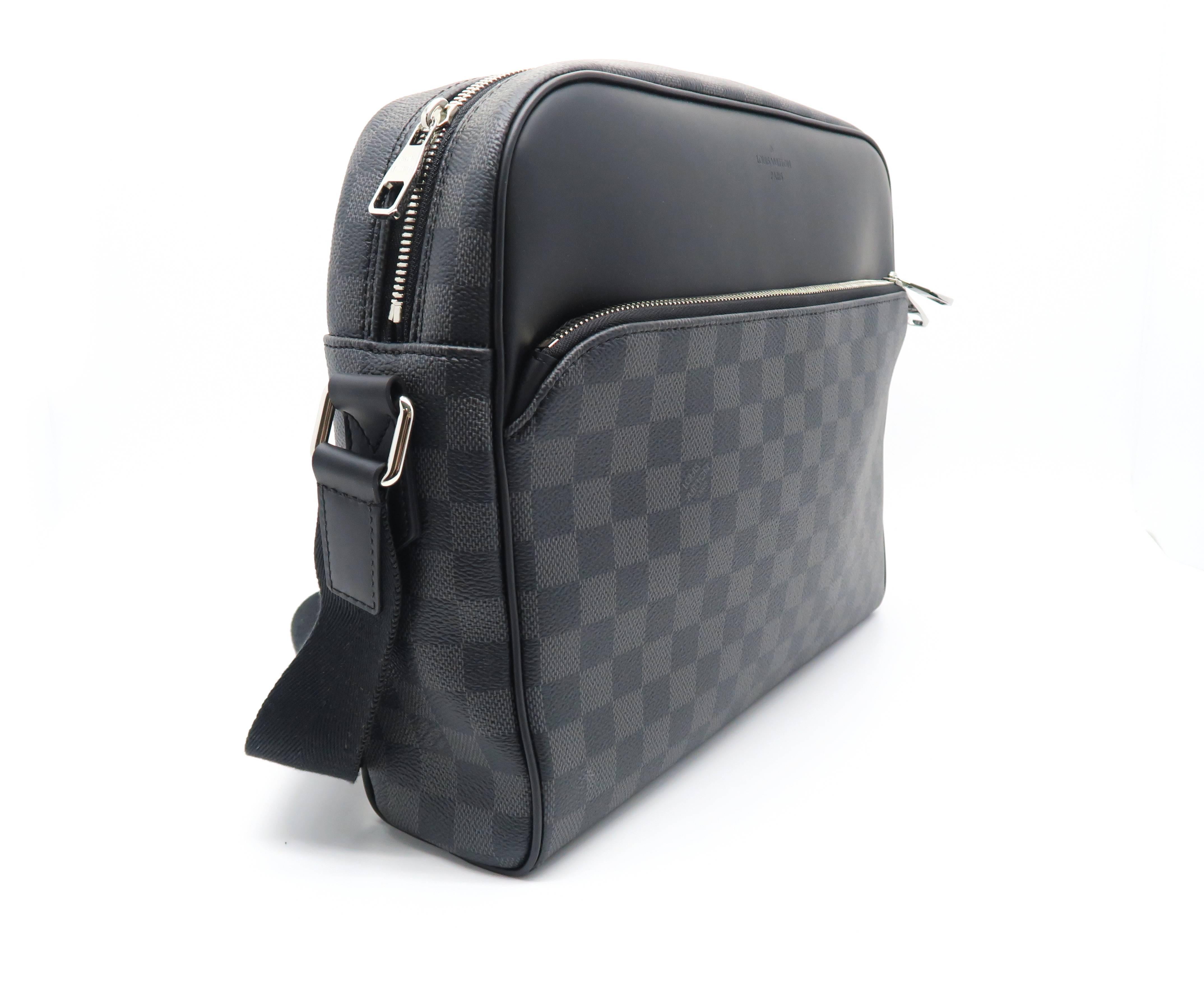 Color: Grey-Ish Black

Material: Damier Graphite

Condition: New 
Overall: Brand New, Not Used
Surface: Good
Corners: Good 
Edges: Good
Handles/Straps: Good
Hardware: Good

Dimension: W34 × H27 × D8cm（W13.3" × H10.6" × D3.1"）
Shoulder