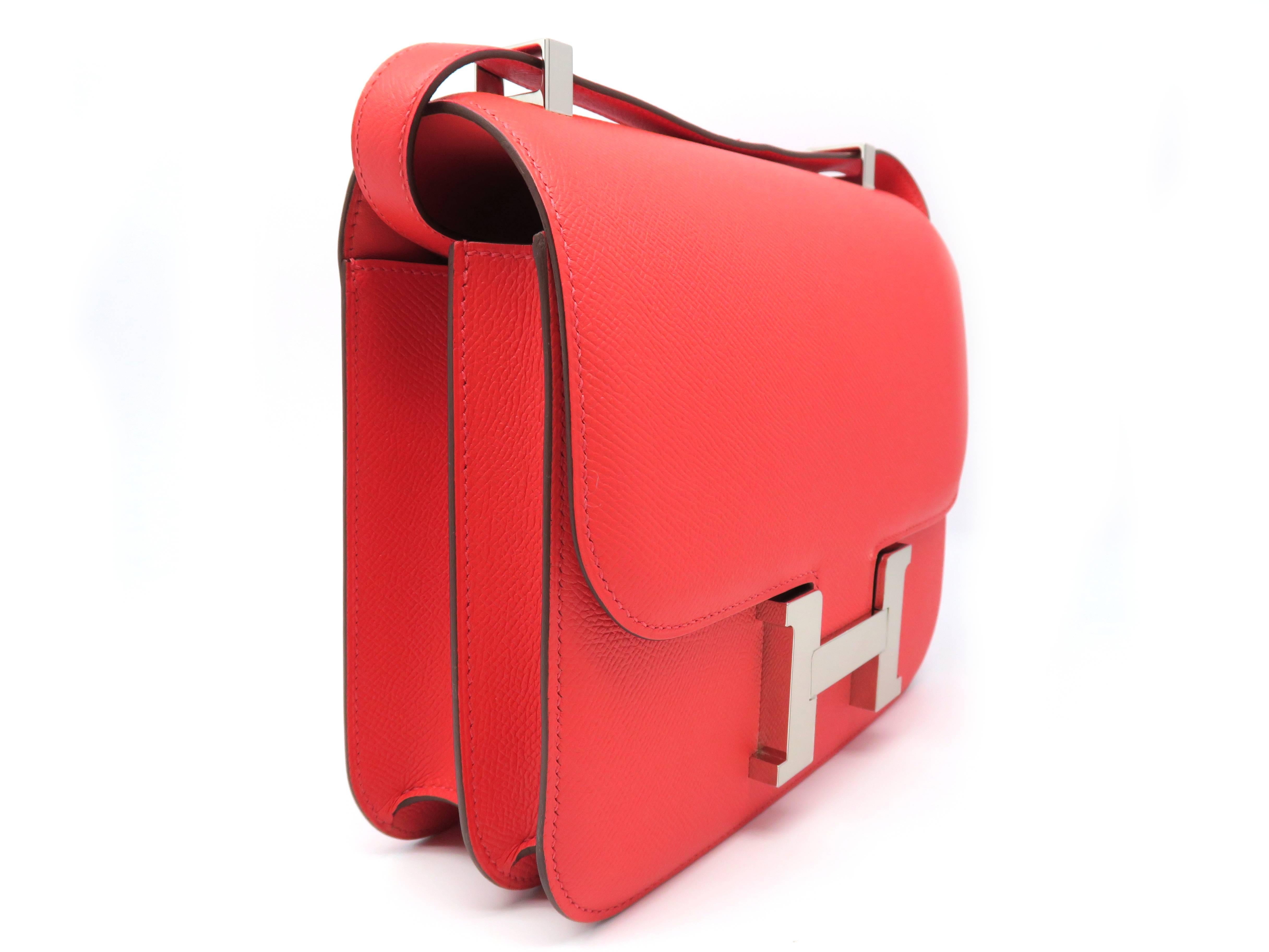 Color: Rouge Tomate (designer color)

Material: Veau Epsom Leather

Condition: Rank N
Overall: Brand New, Not Used
Surface: Good
Corners: Good
Edges: Good
Handles/Straps: Good
Hardware: Good

Dimensions: W24 × H15 × D5cm（W9.4" × H5.9" ×