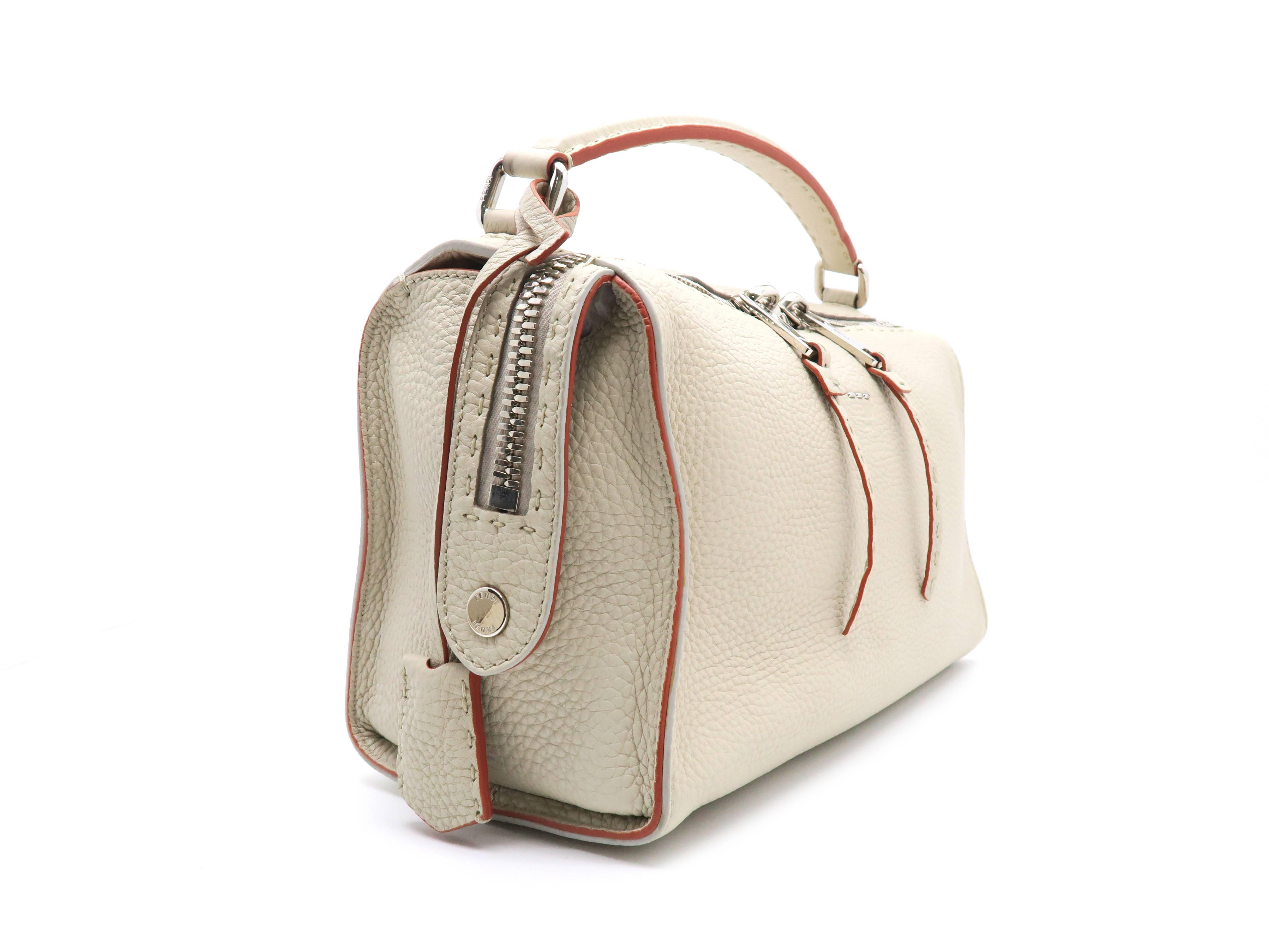 Color: Beige

Material: Calfskin Leather

Condition: Rank  A
Overall: Good, few minor defects
Surface: Minor Scratches
Corners: Minor Scratches
Edges: Minor Scratches
Handles/Straps: Minor Scratches
Hardware: Minor Scratches

Dimension: W29.5 × H16