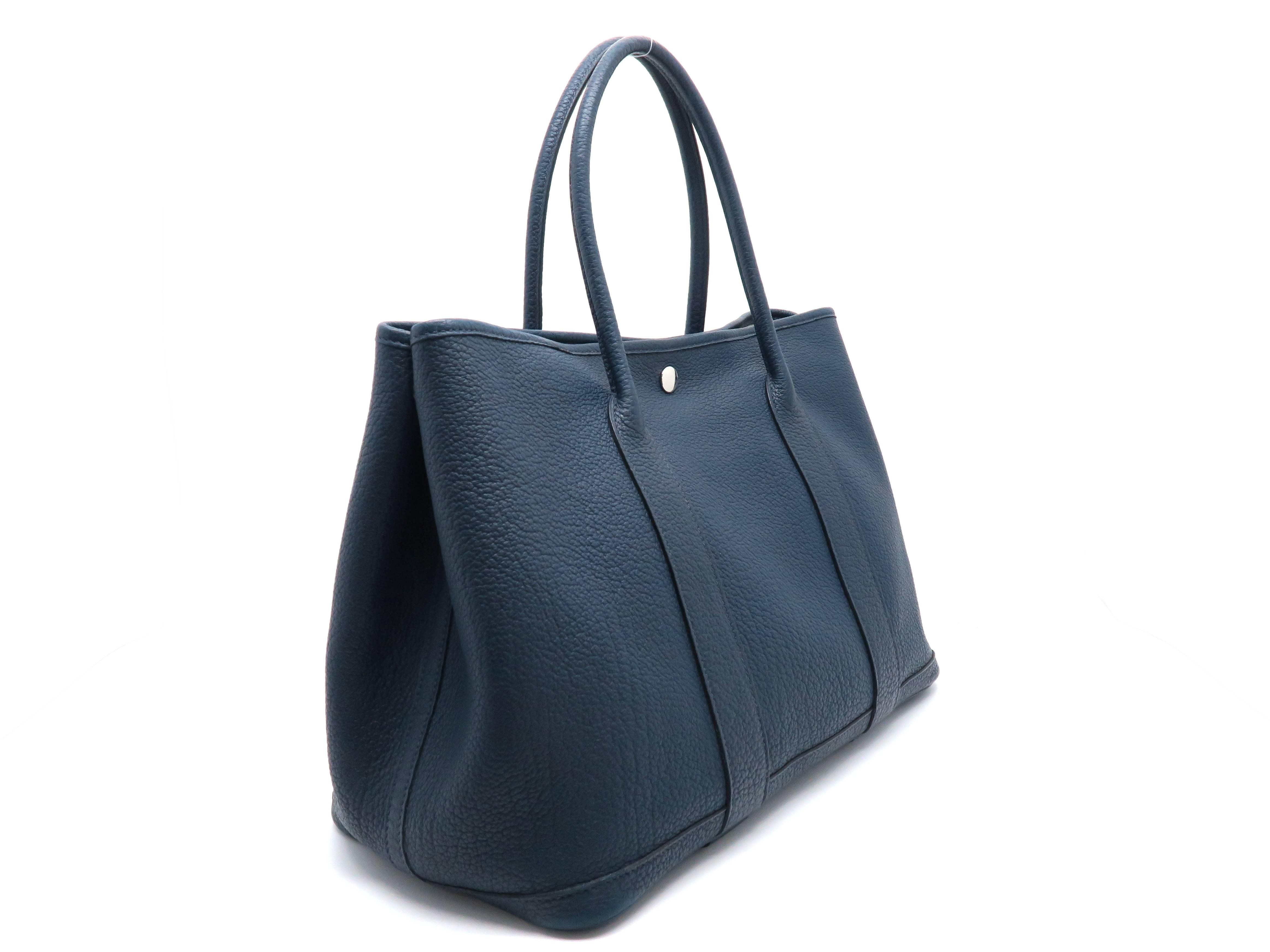 Color: Blue / Bleu De Presse ( Design Color )

Material: Togo Leather

Condition: Rank A 
Overall: Good, few minor defects
Surface: Good
Corners: Minor Scratches
Edges: Minor Scratches
Handles/Straps: Minor Scratches
Hardware: Minor