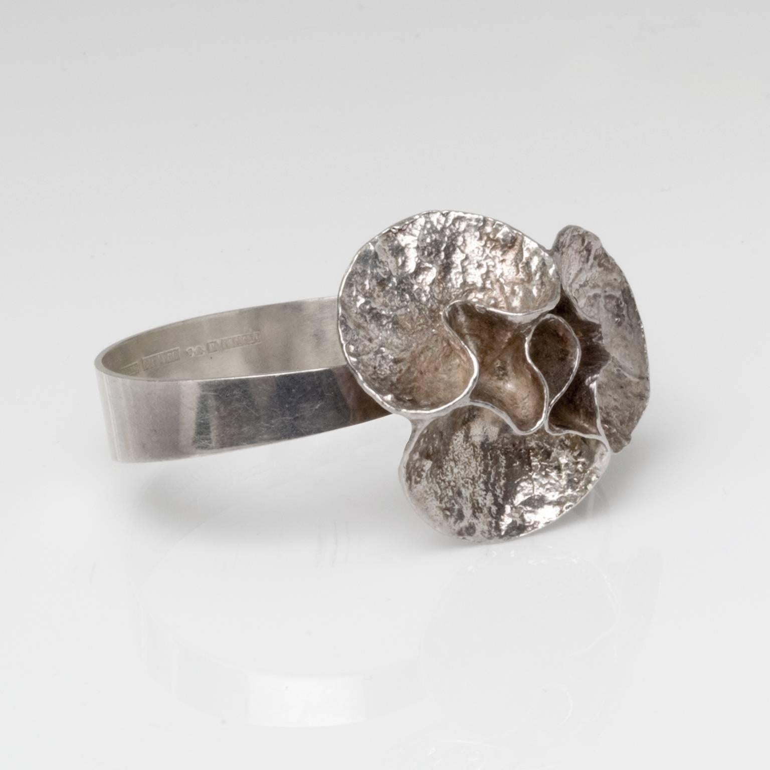 Silver bracelet with acid treated surface by Theresia Hvorslev and stamped 'Mema', Lidkoping, Sweden, 1976.