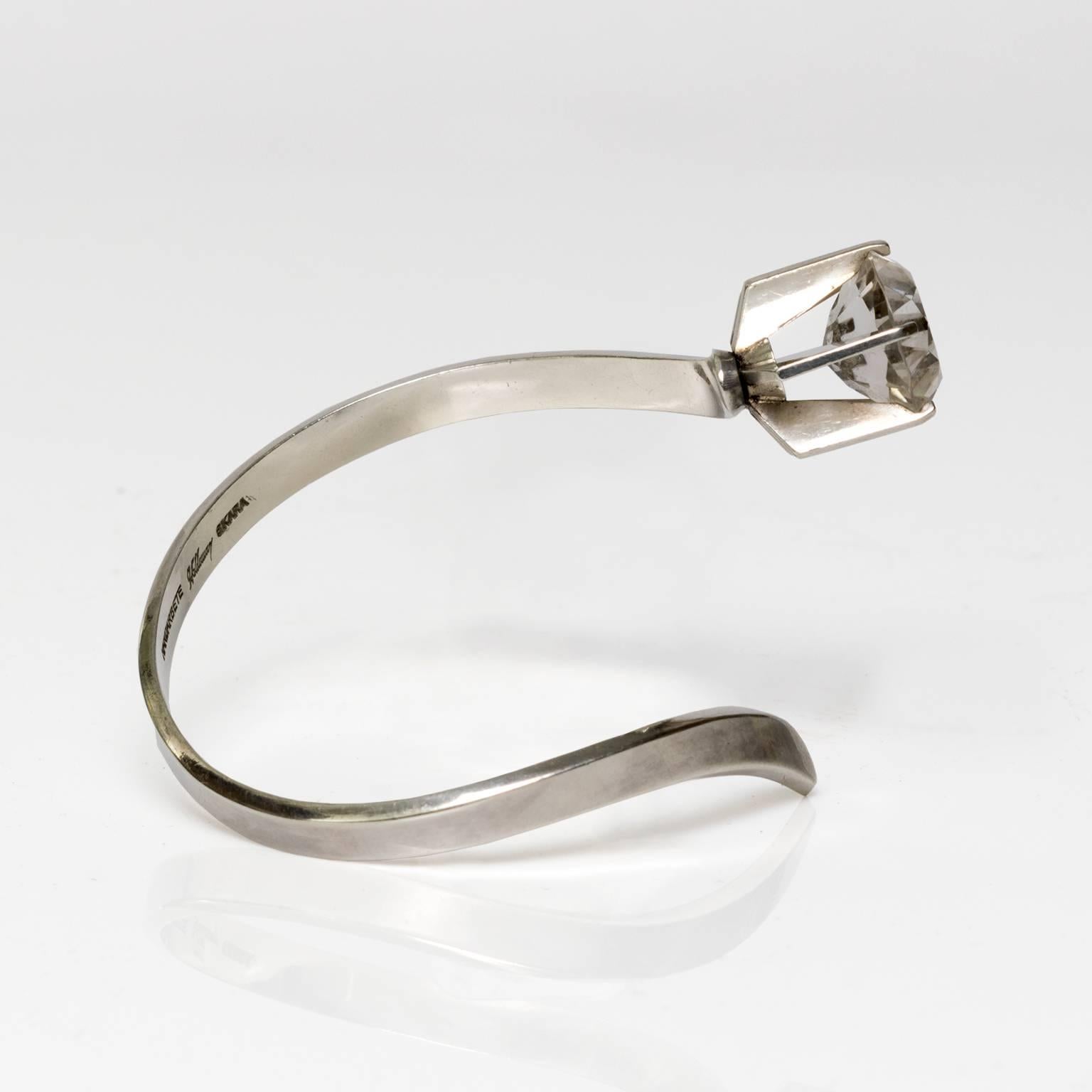 Scandinavian Modern silver bracelet with rock crystal by silversmith  Waldemar Jonsson in Skara, Sweden, 1969.
Diameter: 2.75