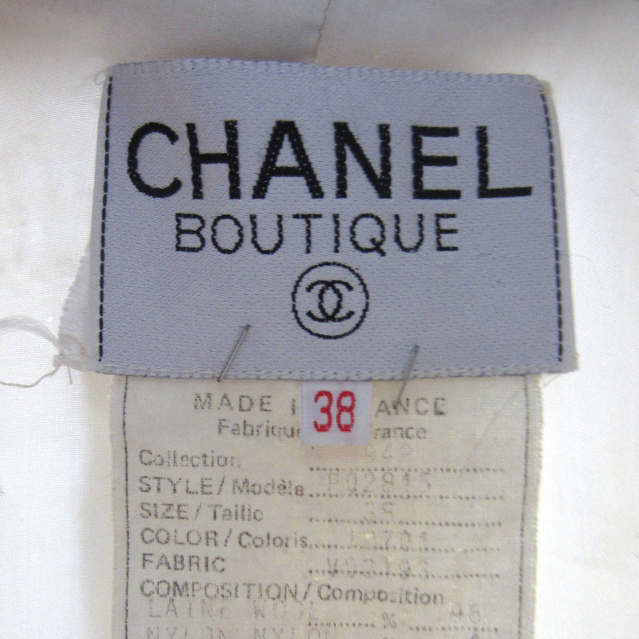 CHANEL Creme Wool Blaser with Double Pocket Detail and Gold Logo Buttons In Good Condition In New York, NY