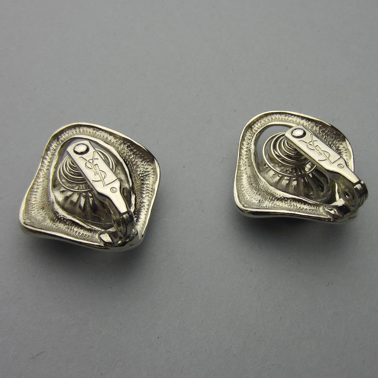 YVES SAINT LAURENT Silver Rhinestone Clip on Earrings In Excellent Condition For Sale In New York, NY