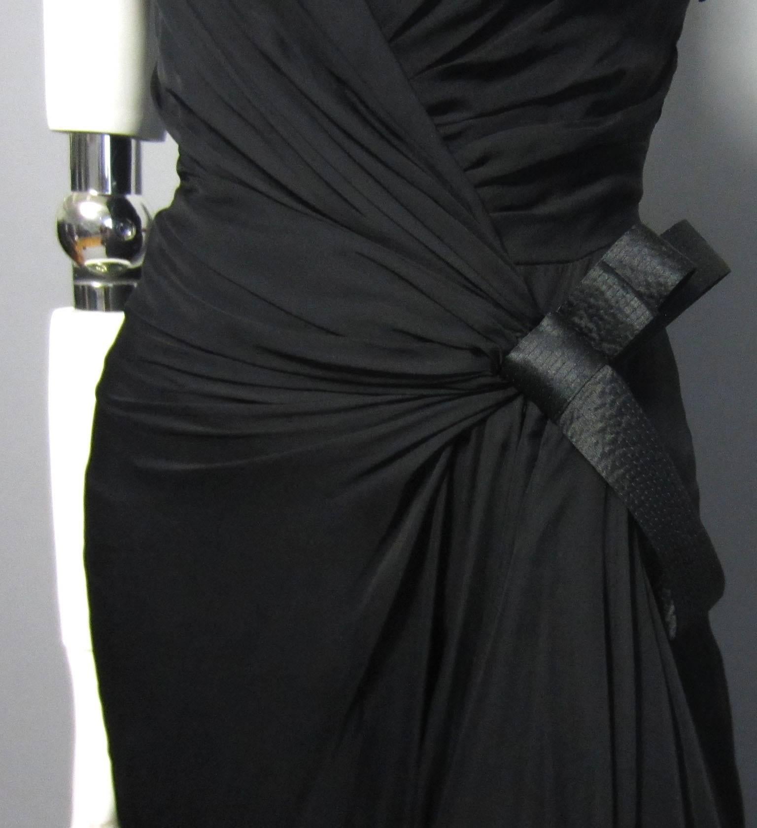 VERSACE Black Chiffon Gown with Asymmetrical Bow and Strap Detail In Excellent Condition For Sale In New York, NY