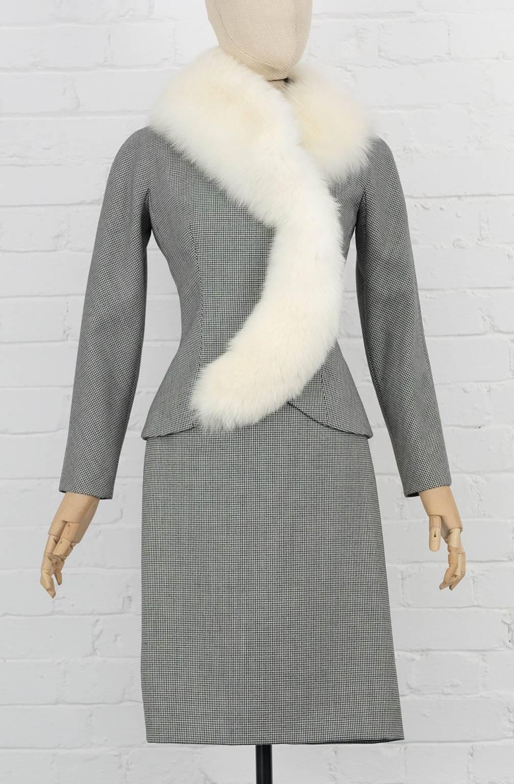 Wool houndstooth fox fur skirt suit from Christian Dior by John Galliano featuring a fitted jacket with removable fox fur collar and a fitted pencil skirt with rear button details. 

Shoulder to shoulder 50cm

circa 1990s