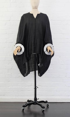 2016 Junya Watanabe linen cape dress featuring metal cuffs