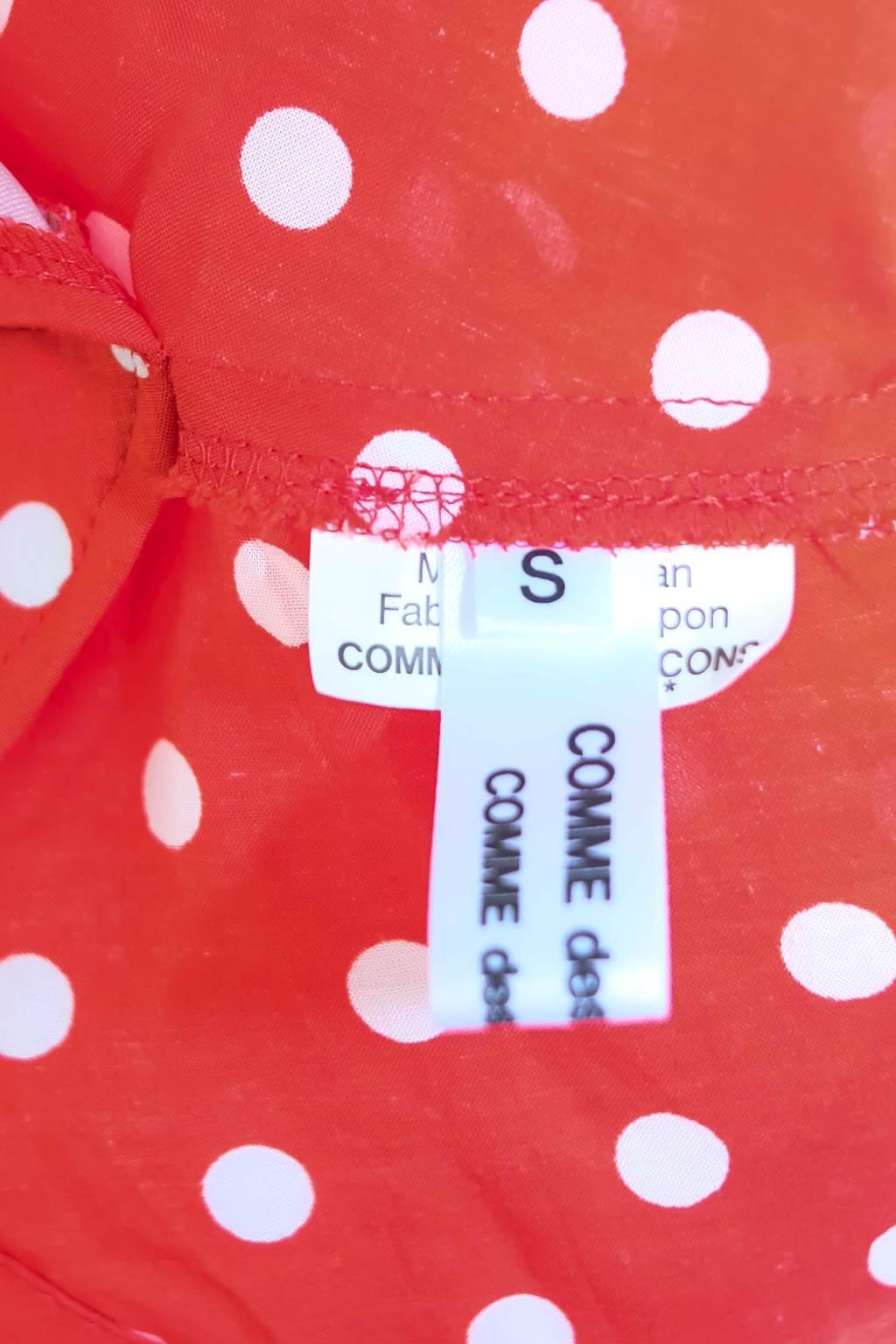 Women's 2014 Comme des Garcons polka dot red apron dress.