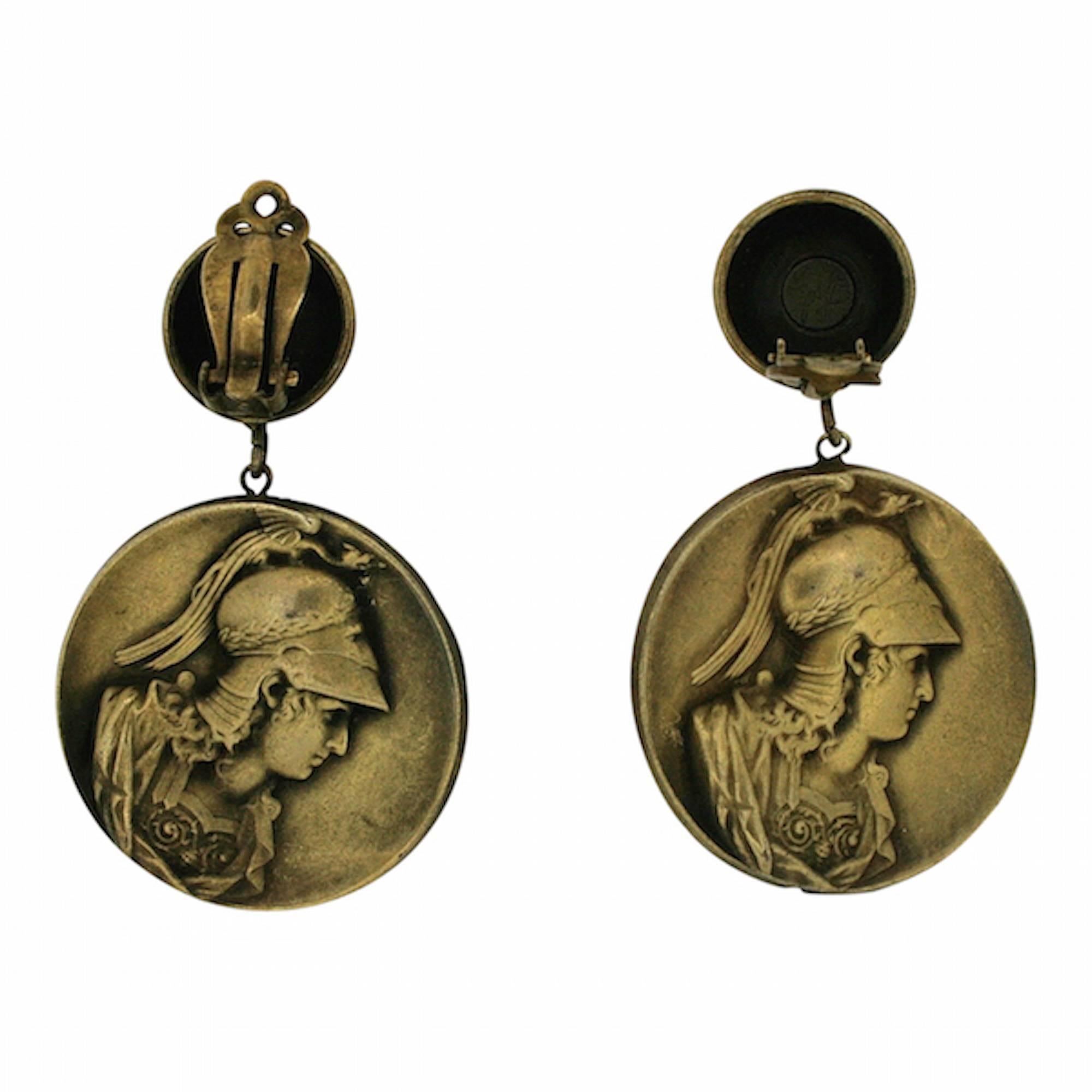 Featuring a 'Britannia' design, these earrings date from the late 1940s and were produced as part of Joseff of Hollywood's 'Ginger Rogers Collection' of jewellery. The earrings are clip on. 

Condition Report:
Excellent

These pendant earrings are