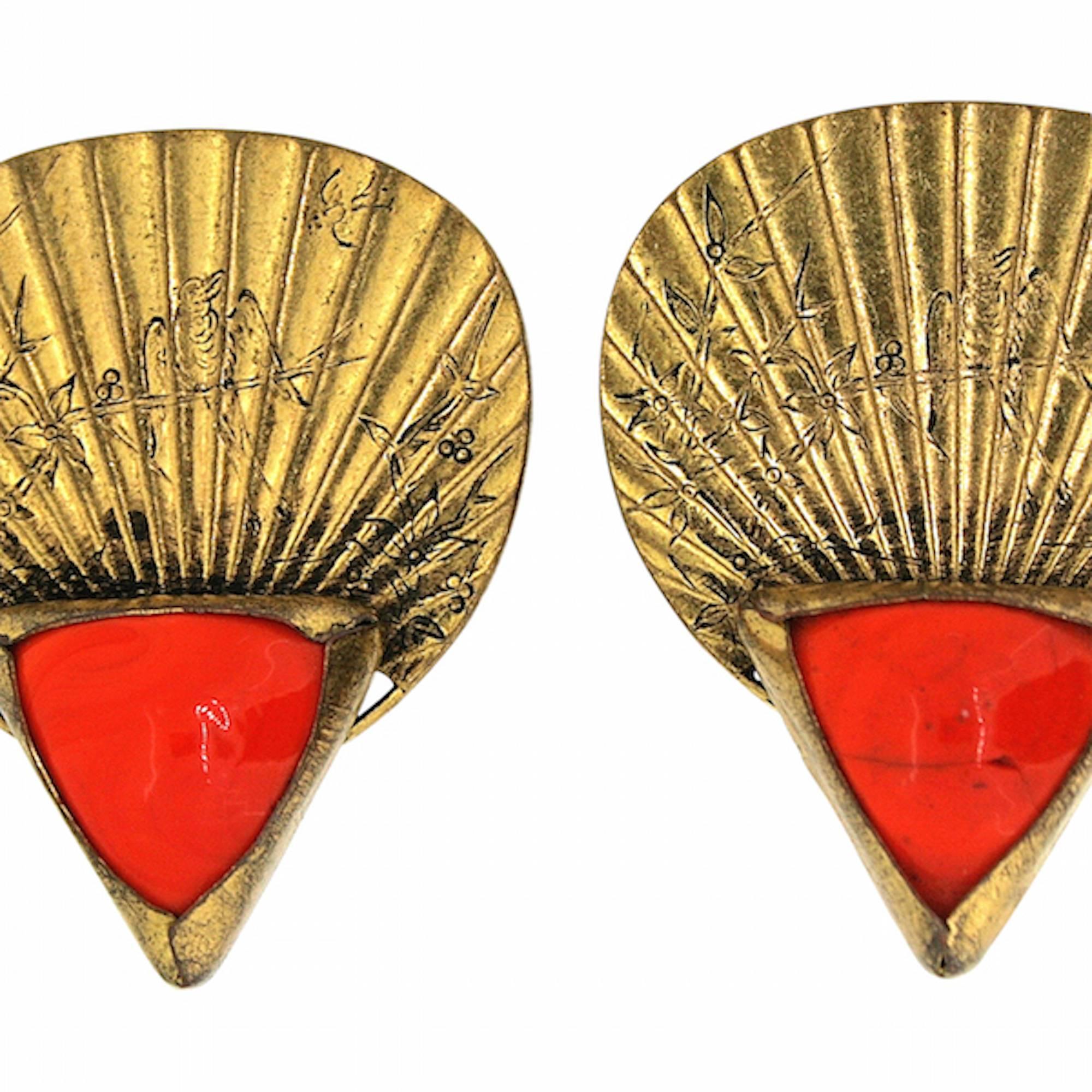 These fabulous earrings are a rare and wonderful piece of early Chanel jewellery. They are clip on. 

Condition Report: Good - A minor crack to the surface of one of the orange glass stones. This is visible only on close inspection and does not