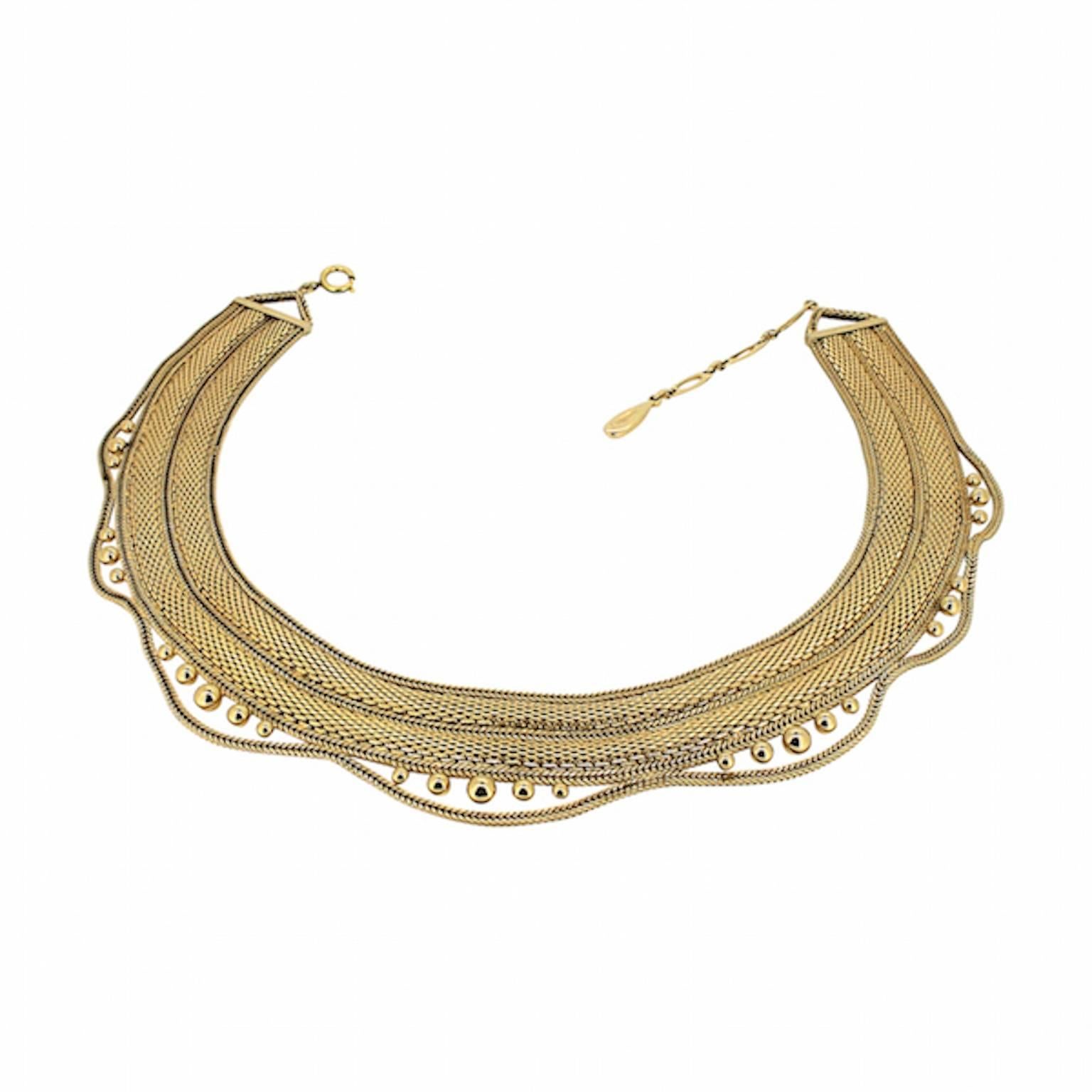 A very special piece by Christian Dior. This necklace was created in the late 1950s or early 1960s. Made in Germany, its construction and design is exemplary. 

Condition Report:
Excellent

The Details...
This stunning necklace is gold plated. The