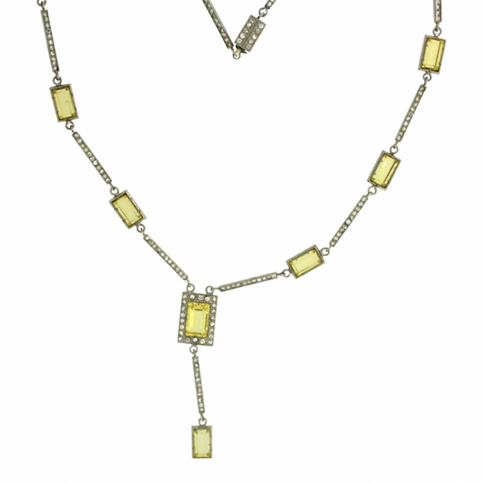 This elegant necklace necklace dates from the 1920s. Although unsigned, this piece is beautifully crafted and timeless.
Condition Report:
Excellent

The Details...
This necklace, although unmarked, is likely to be silver. It features lengths of