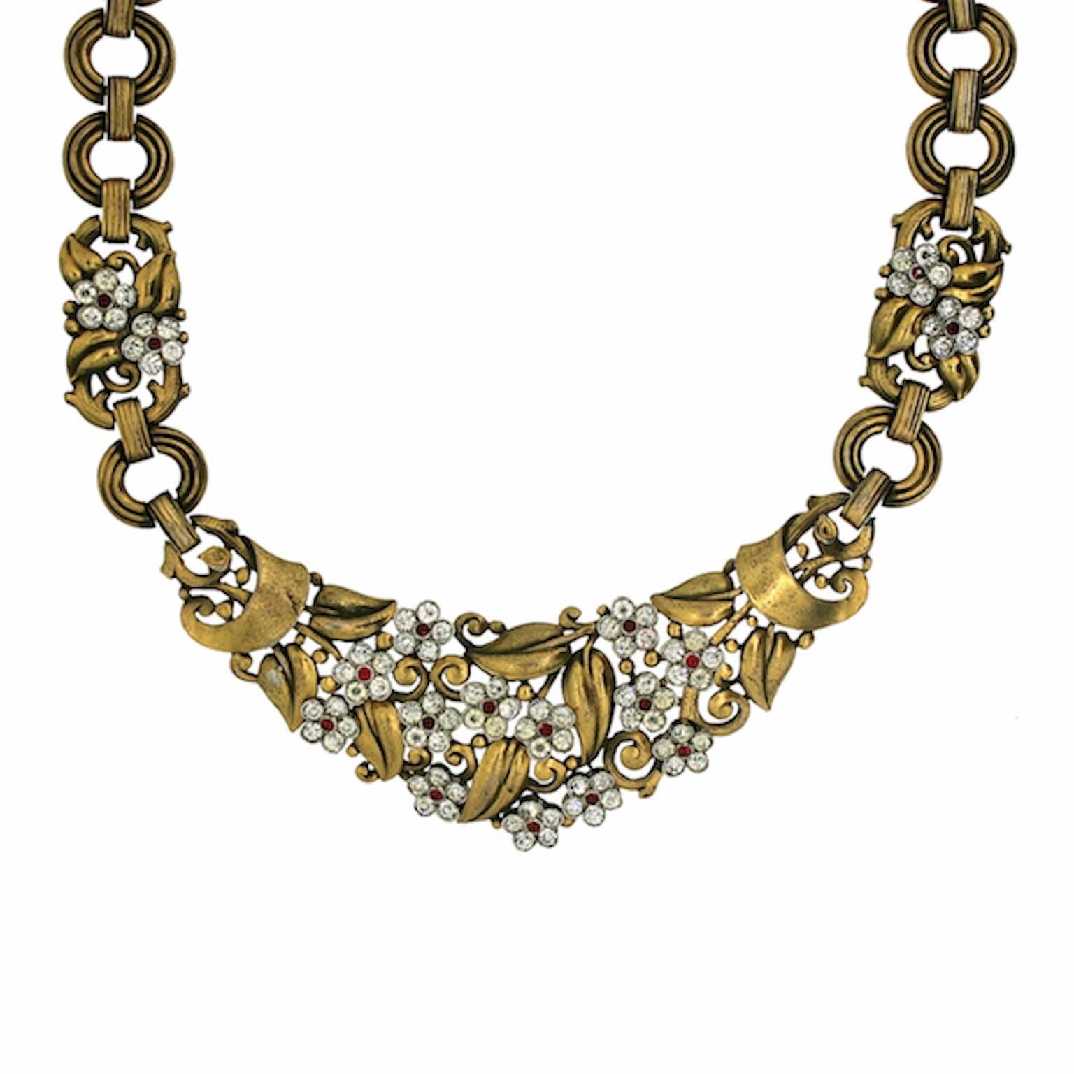 This necklace is a perfect example of Trifari's creative rhinestone design and craftsmanship. It was made by the American company in the 1940s.
Condition Report:
Very Good - Minor wear to the gilt metal consistent with age and use. This is only