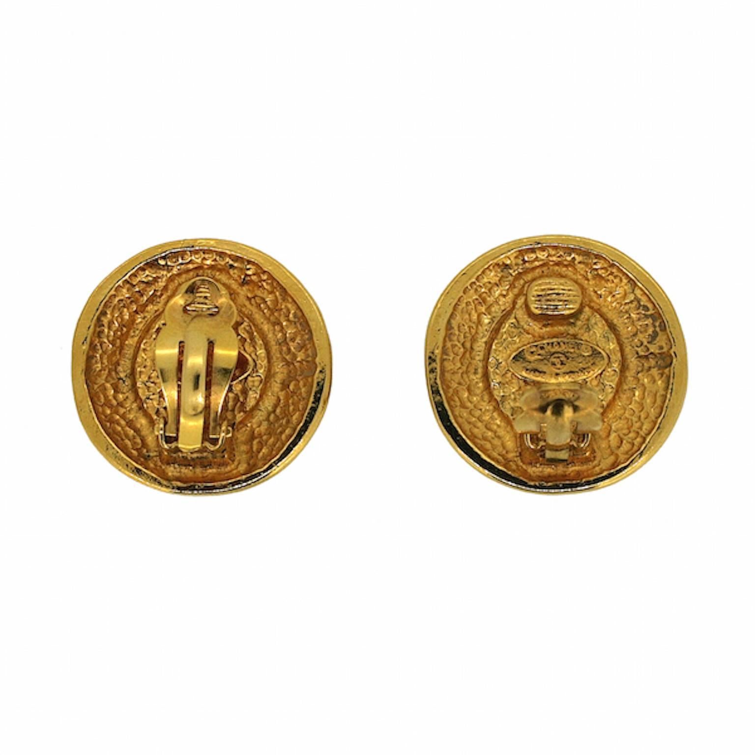 These 1980s earrings are made by Chanel, they ooze glamour and reflect the design house's classic aesthetic. They are clip on. 
Condition Report:
Excellent
The Details...
These large, gold plated, circular earrings feature an embossed baroque style
