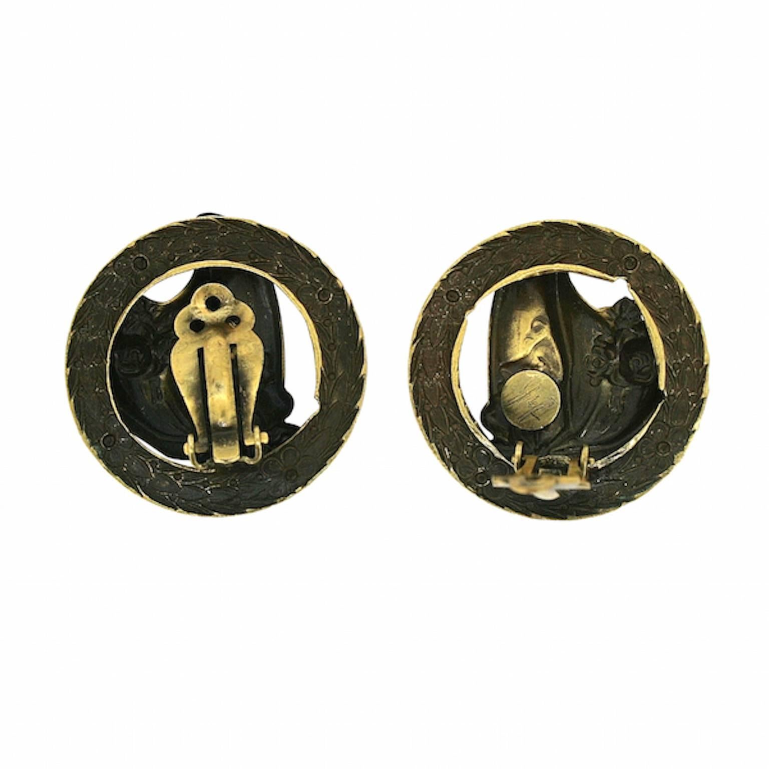 Featuring a 'Victorian Lady' design, these earrings date from the late 1940s and are clip on. They are a beautiful example of Joseff of Hollywood's whimsical jewellery.
Condition Report:
Excellent
The Details...
These disc earrings are made from