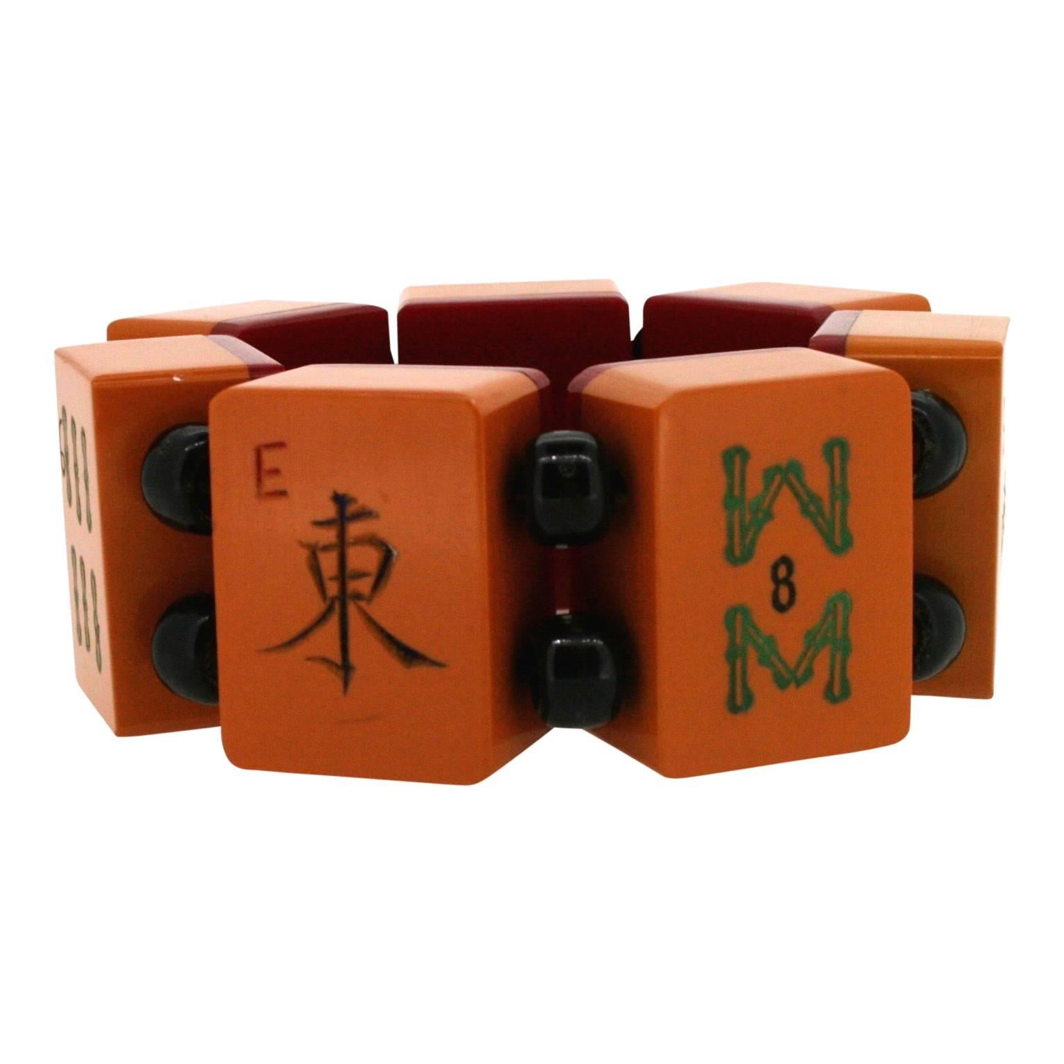 Featuring a typically vibrant orange hued Bakelite, this whimsical bracelet dates from the 1930s.
Condition Report:
Very Good - A little wear to the paint in places consistent with age and use. This is only visible upon very close inspection and